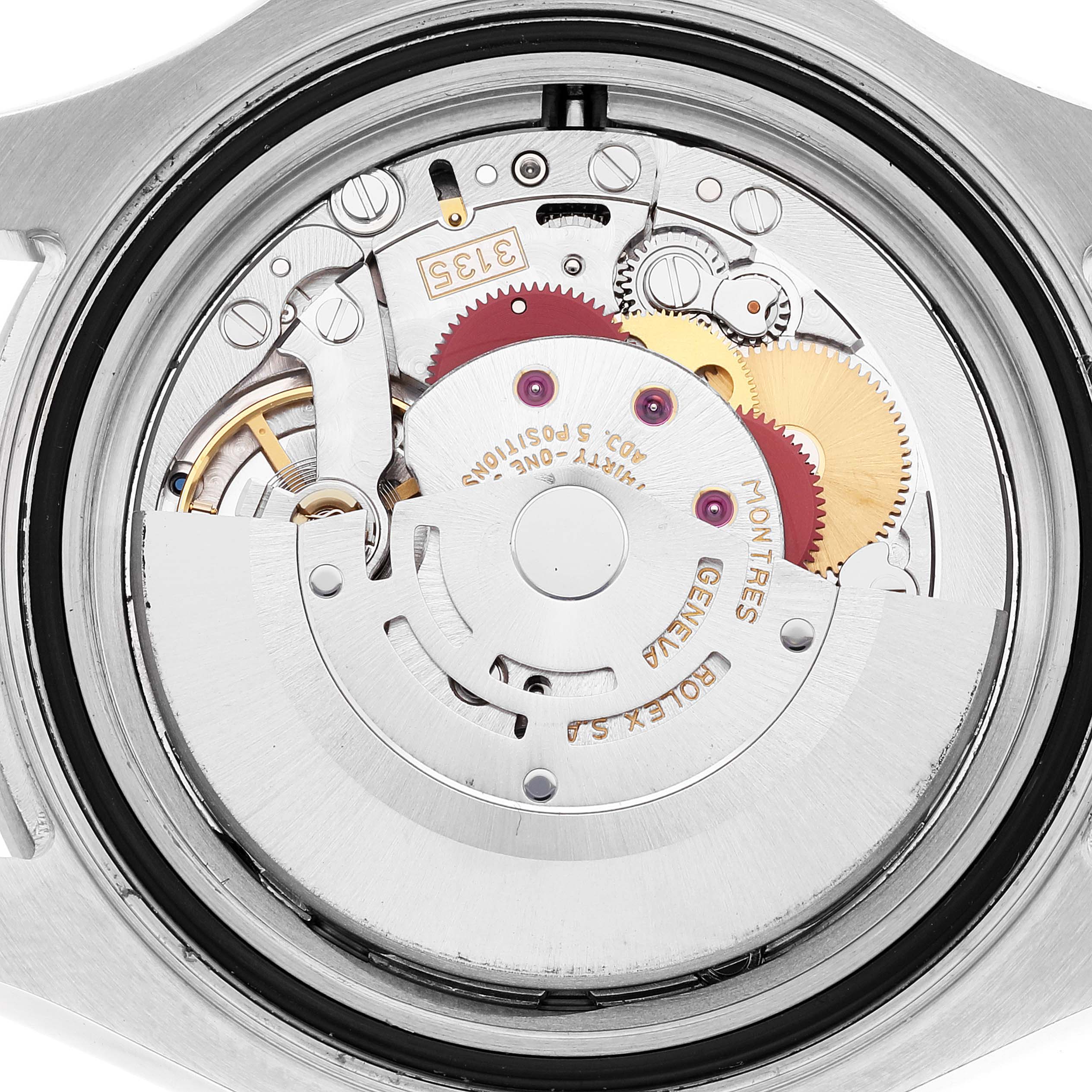 The image shows the intricate inner movement components of a Rolex Yacht-Master 16622 Men
s Stainless Steel Silver Dial 16622 Men
s Stainless Steel Silver Dial watch from a rear case angle.