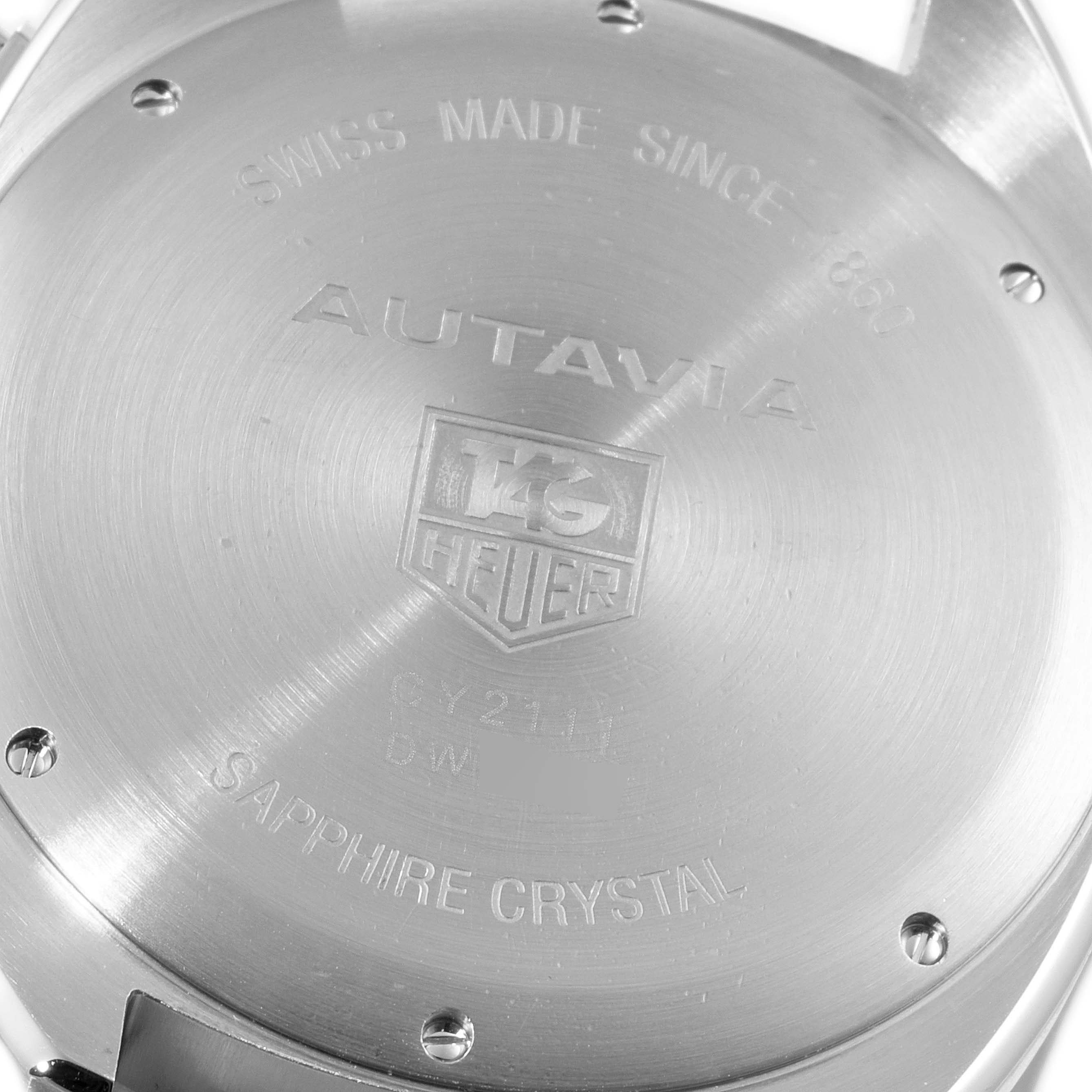 The image shows the back case of a Tag Heuer Autavia CY2111 Men's Stainless Steel Black Dial CY2111 Men's Stainless Steel Black Dial watch, highlighting the engraved details.