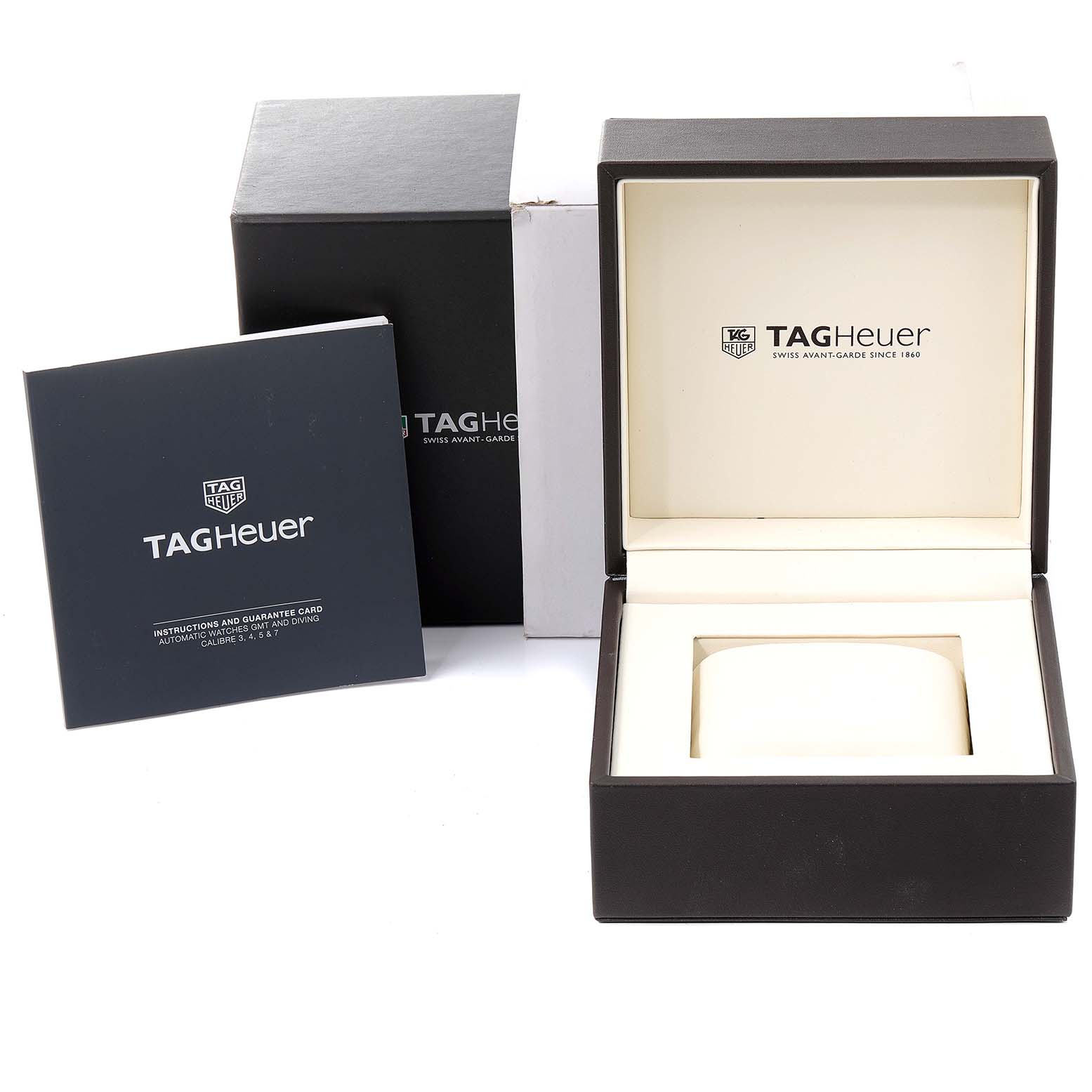 The image shows a Tag Heuer Carrera WAR201E.BA0723 Men
s Stainless Steel Blue Dial WAR201E.BA0723 Men
s Stainless Steel Blue Dial watch box, an outer cover, and an instruction manual.