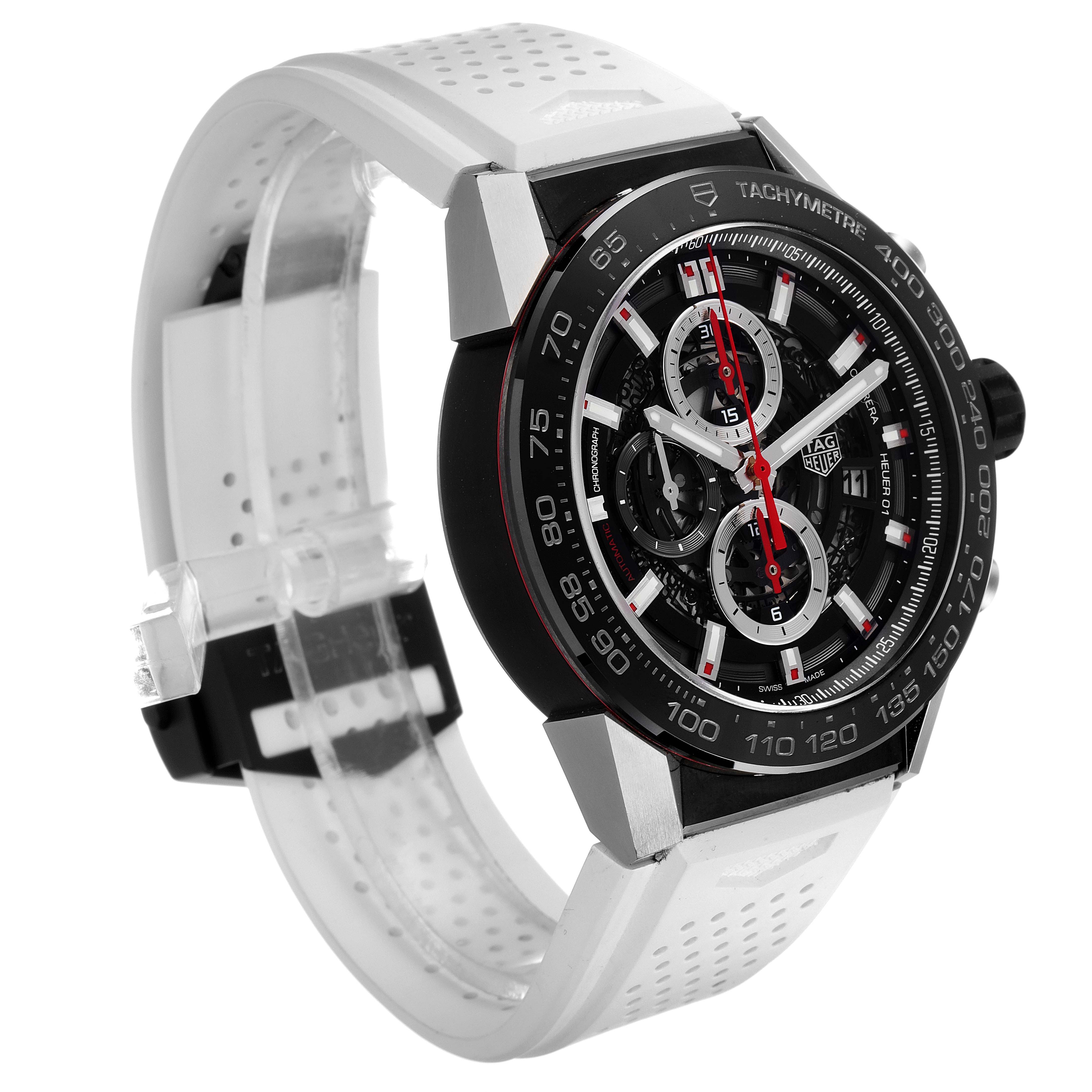 The Tag Heuer Carrera CAR2A1Z.FT6051 Men
s Stainless Steel Black Dial CAR2A1Z.FT6051 Men
s Stainless Steel Black Dial watch is shown at a front-side angle, featuring its dial, tachymeter bezel, and white perforated strap.