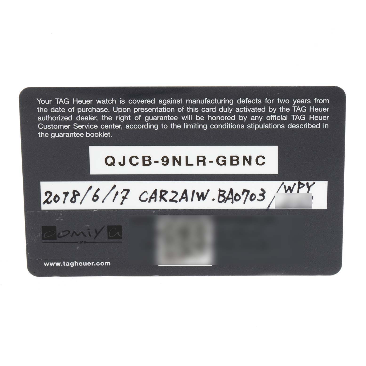 This image shows a warranty card for the Tag Heuer Carrera CAR2A1W.BA0703 Men's Stainless Steel Transparent Dial CAR2A1W.BA0703 Men's Stainless Steel Transparent Dial model watch.