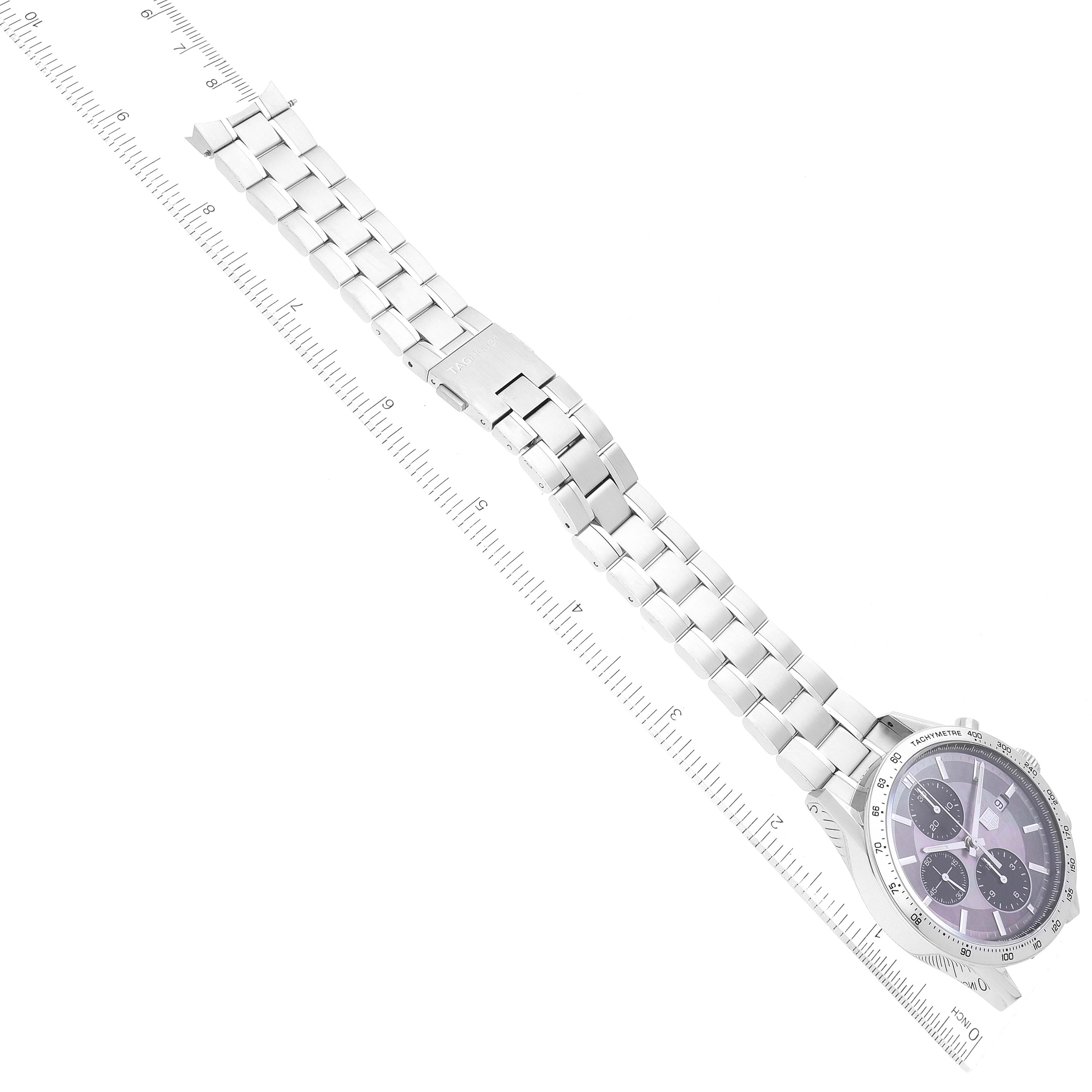 The image shows a Tag Heuer Carrera CV201P Men's Stainless Steel Mother of Pearl Dial CV201P Men's Stainless Steel Mother of Pearl Dial watch laid flat, displaying the face and metal bracelet band next to a ruler.