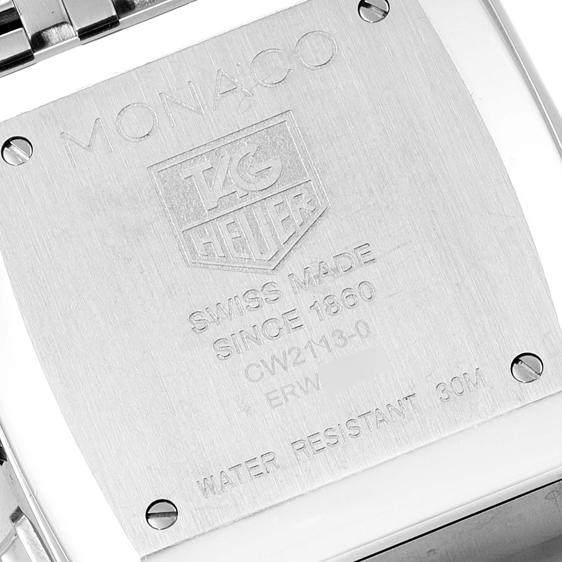 This image shows the case back of a Tag Heuer Monaco CW2113.BA0780 Men's Stainless Steel Blue Dial CW2113.BA0780 Men's Stainless Steel Blue Dial watch, featuring brand engravings and model details.