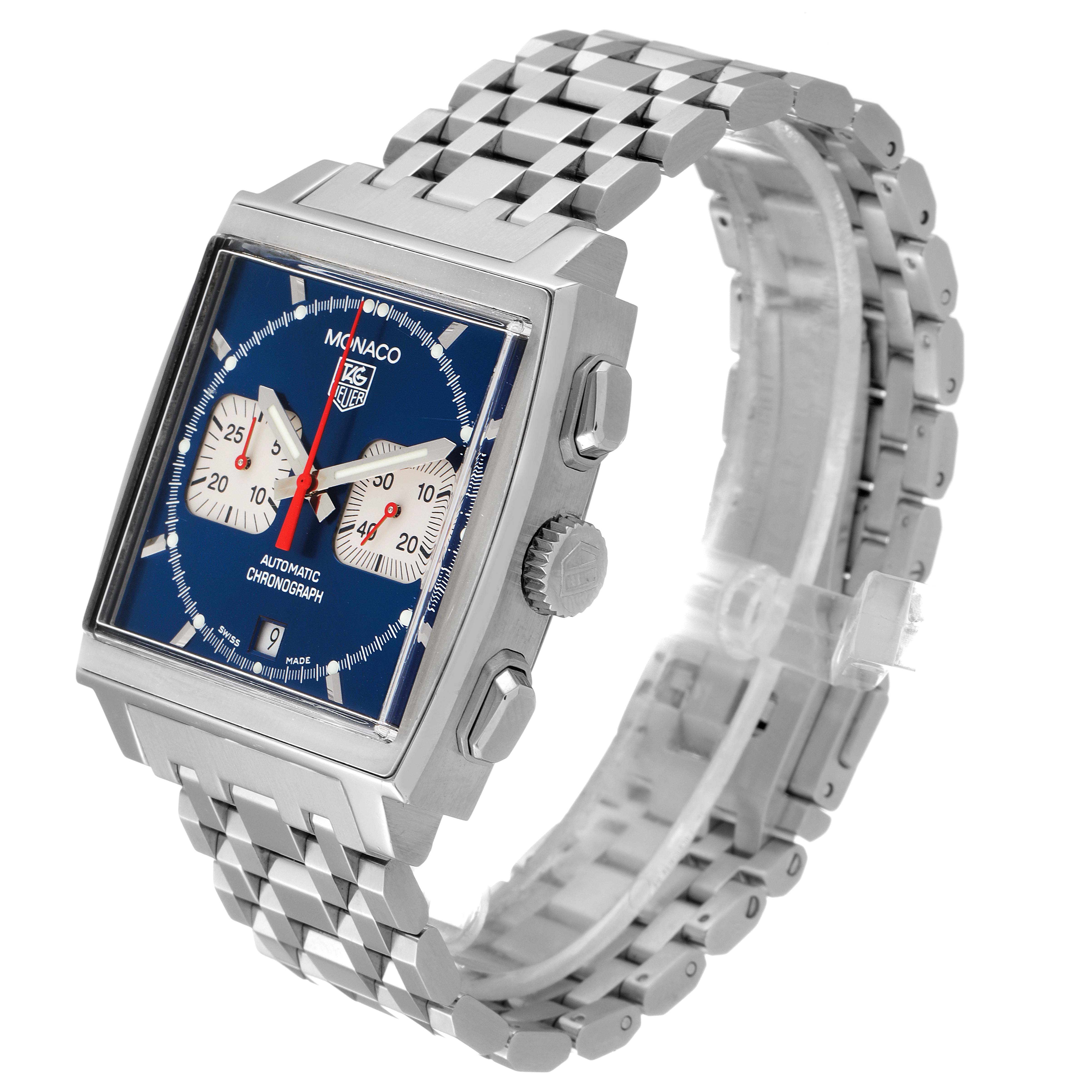 The image shows a Tag Heuer Monaco CW2113.BA0780 Men's Stainless Steel Blue Dial CW2113.BA0780 Men's Stainless Steel Blue Dial watch from a slight top angle, highlighting its square face and metal link band.