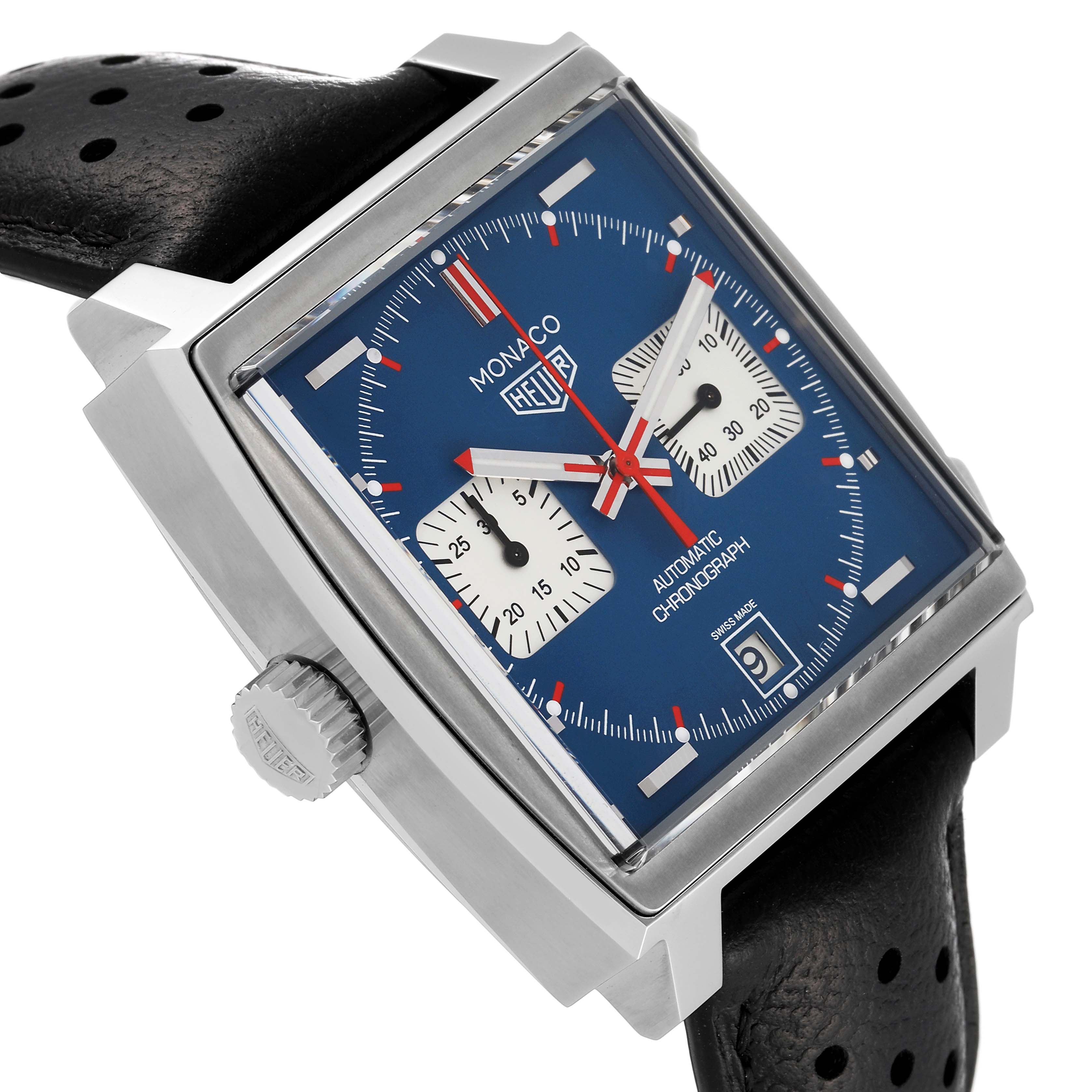 The image shows a close-up angle of the Tag Heuer Monaco CAW211P Men's Stainless Steel Blue Dial CAW211P Men's Stainless Steel Blue Dial watch, highlighting its square dial, chronograph sub-dials, and perforated black leather strap.