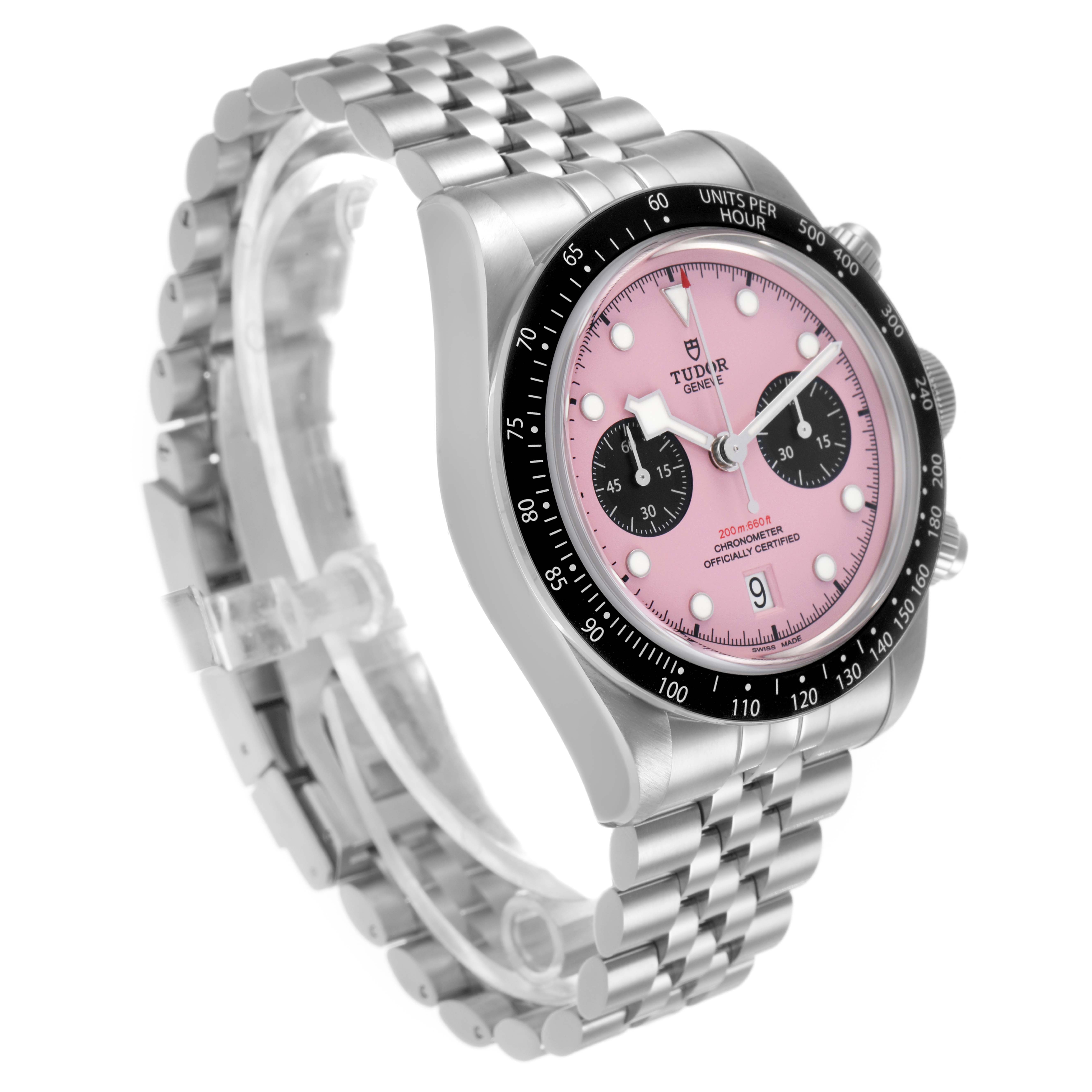 The Tudor Heritage Black Bay M79360N-0019 Men's Stainless Steel Pink Dial watch is shown at a three-quarter angle, displaying the dial, bezel, bracelet, and crown.