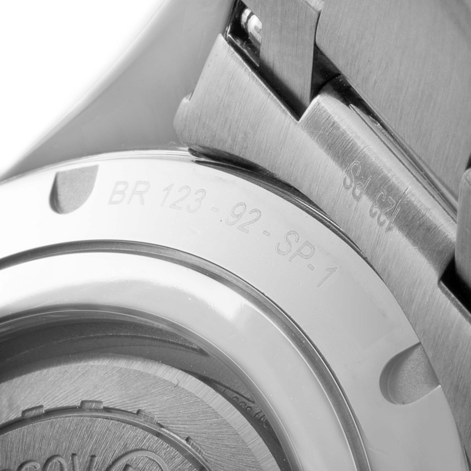 This image shows a close-up of the case back and part of the bracelet of the Bell & Ross Heritage BRV123-ST-HER/SST Men's Stainless Steel Black Dial BRV123-ST-HER/SST Men's Stainless Steel Black Dial model BR 123 - 92 - SP-1.