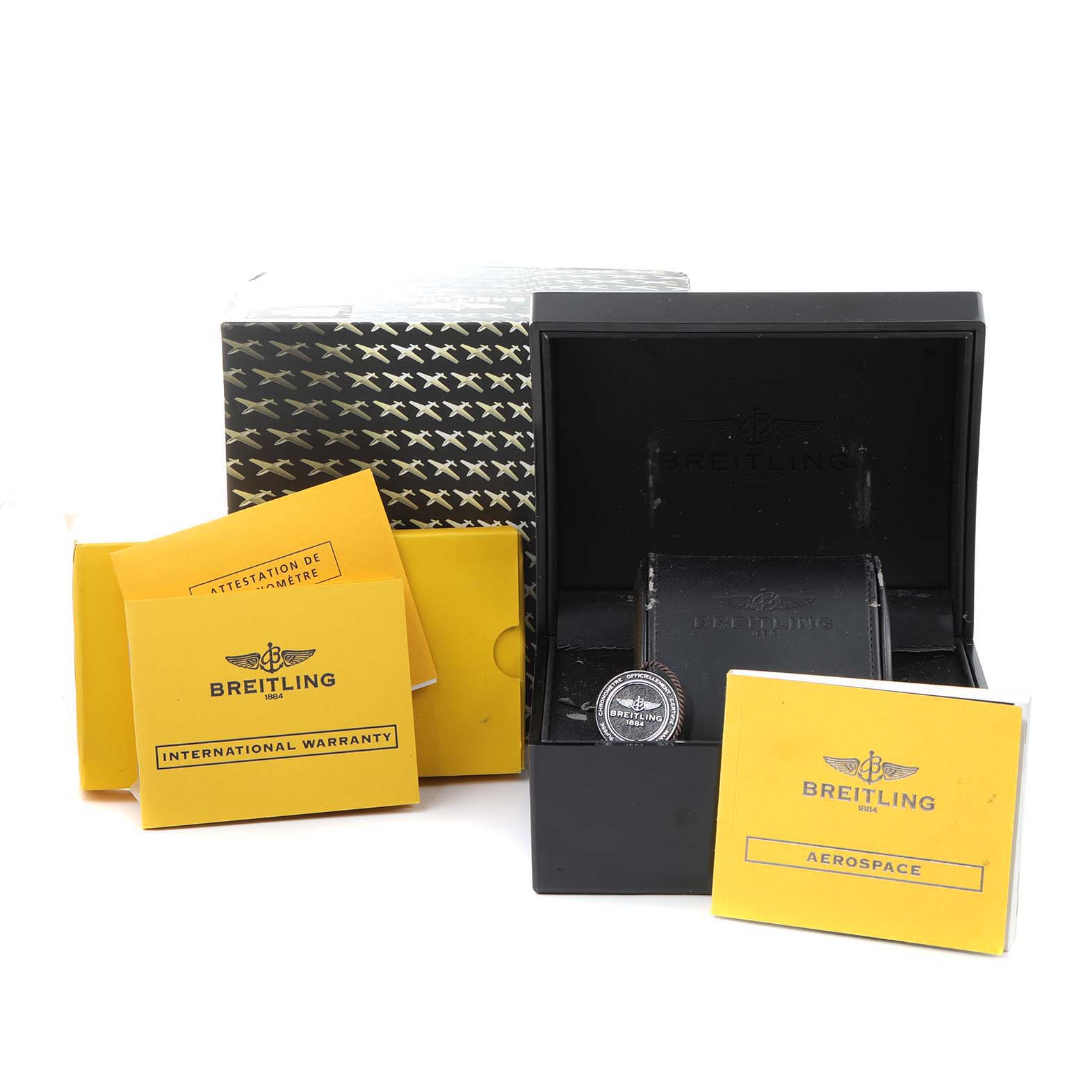This image shows the packaging, box, and warranty documents of a Breitling Professional Series E79362 Men's Titanium Grey Dial E79362 Men's Titanium Grey Dial model watch.