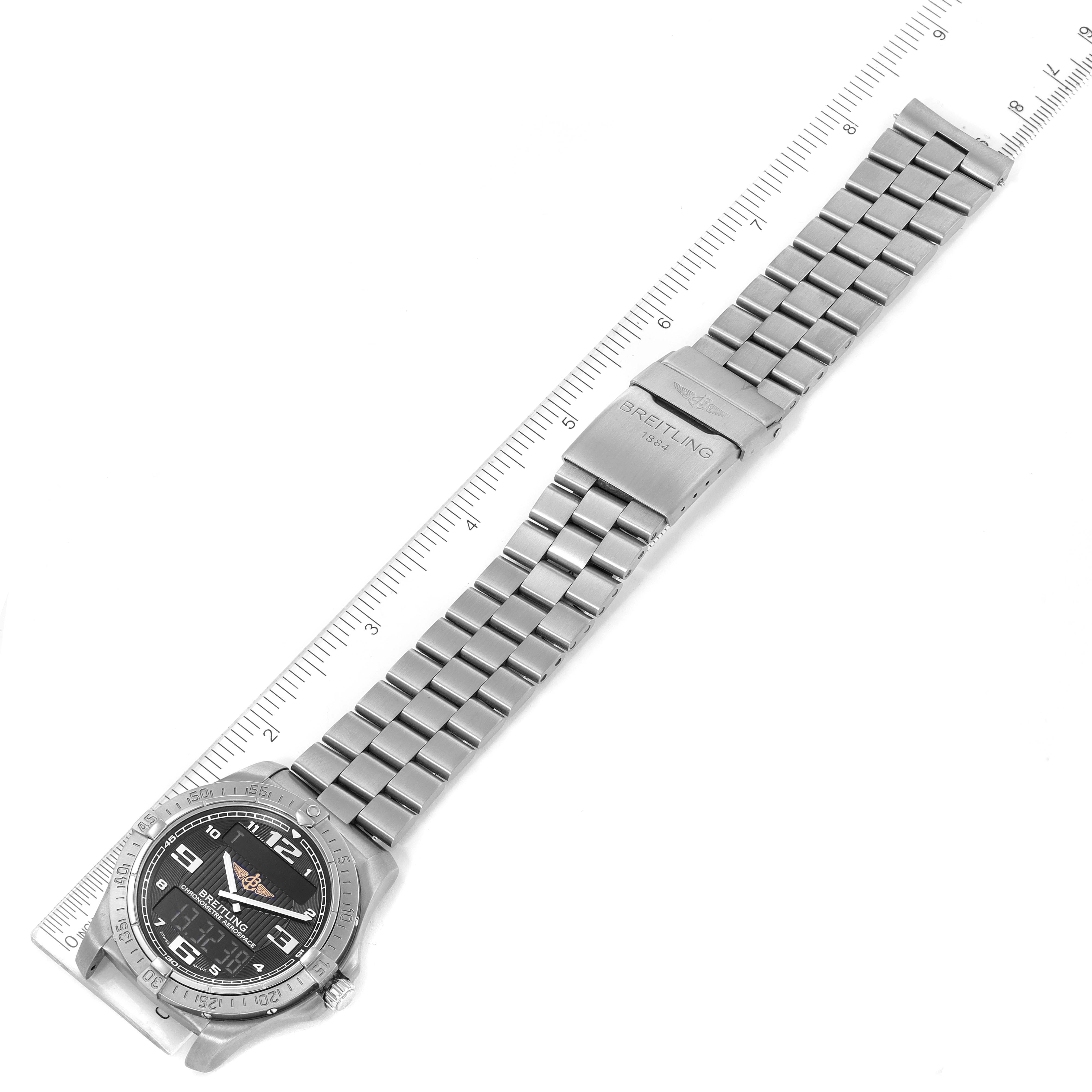 The Breitling Professional Series E79362 Men's Titanium Grey Dial E79362 Men's Titanium Grey Dial watch is displayed fully extended horizontally with a ruler for scale.
