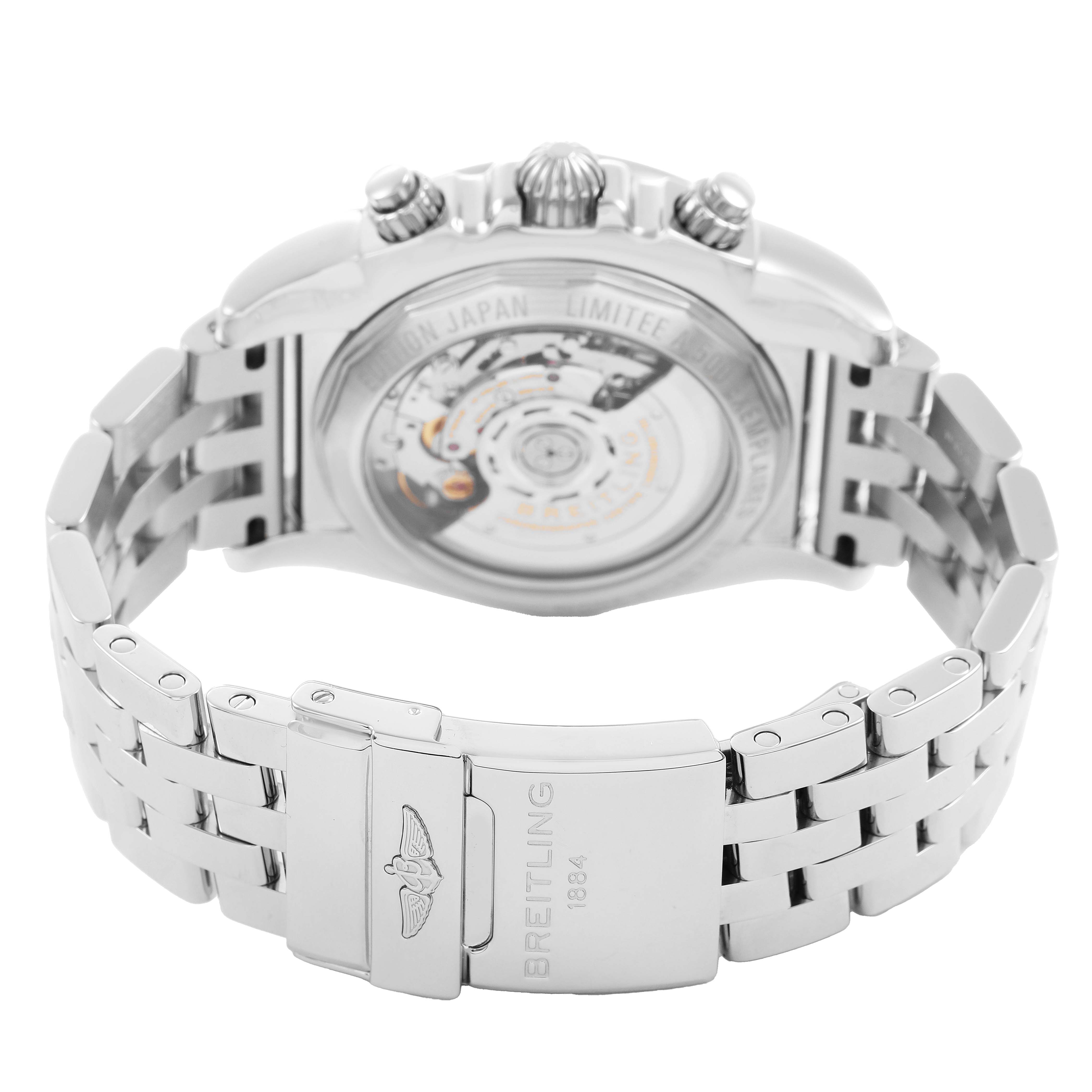 The image shows the back of a Breitling Chronomat AB01111A/BF68 Men's Stainless Steel Mother of Pearl Dial watch, focusing on the open case back and metal bracelet with clasp.