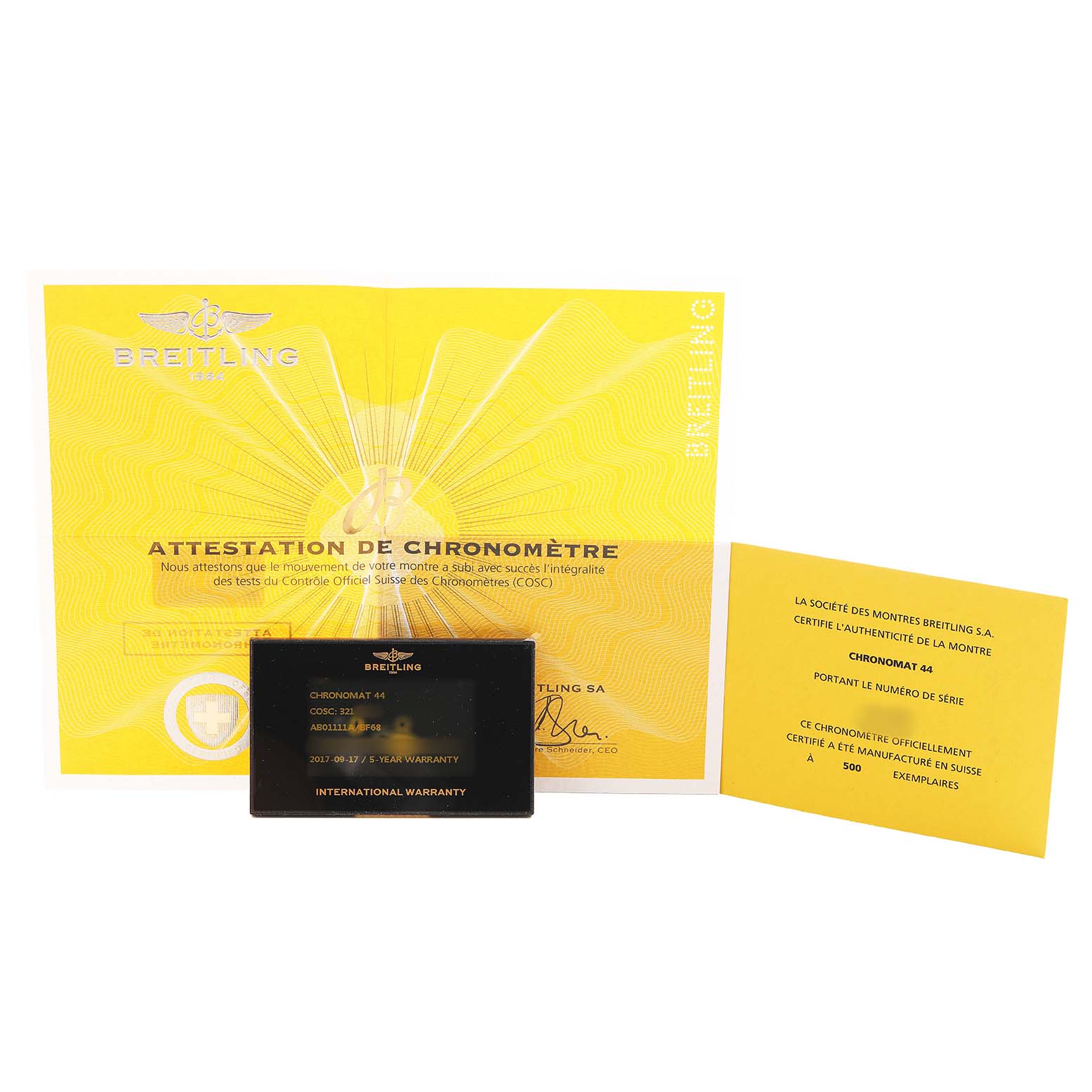 This image shows the certification documents and international warranty card for the Breitling Chronomat AB01111A/BF68 Men's Stainless Steel Mother of Pearl Dial model.