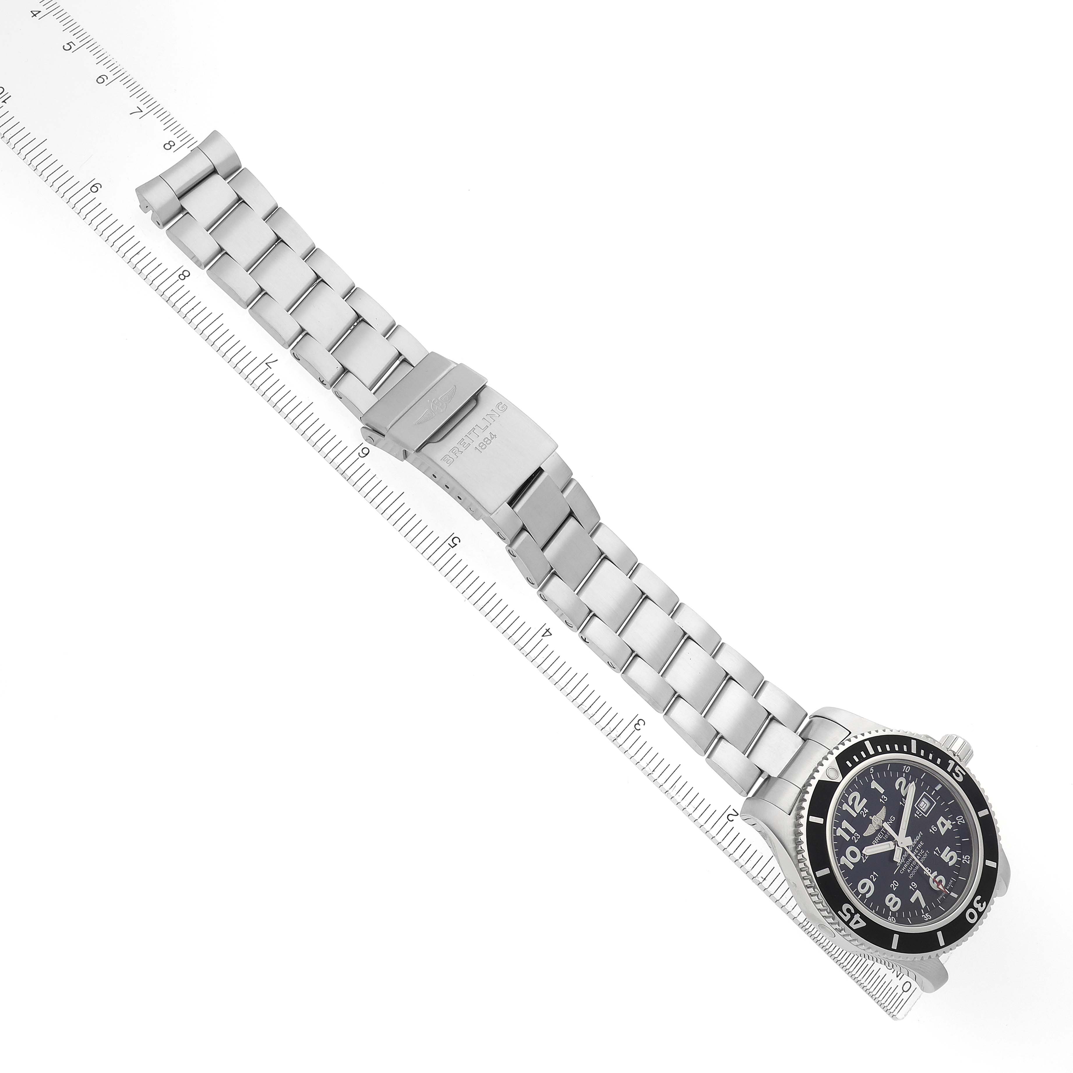 The Breitling Superocean A17392 Men
s Stainless Steel Black Dial A17392 Men
s Stainless Steel Black Dial watch is shown from an angled top view, highlighting the dial, bezel, bracelet, and clasp.