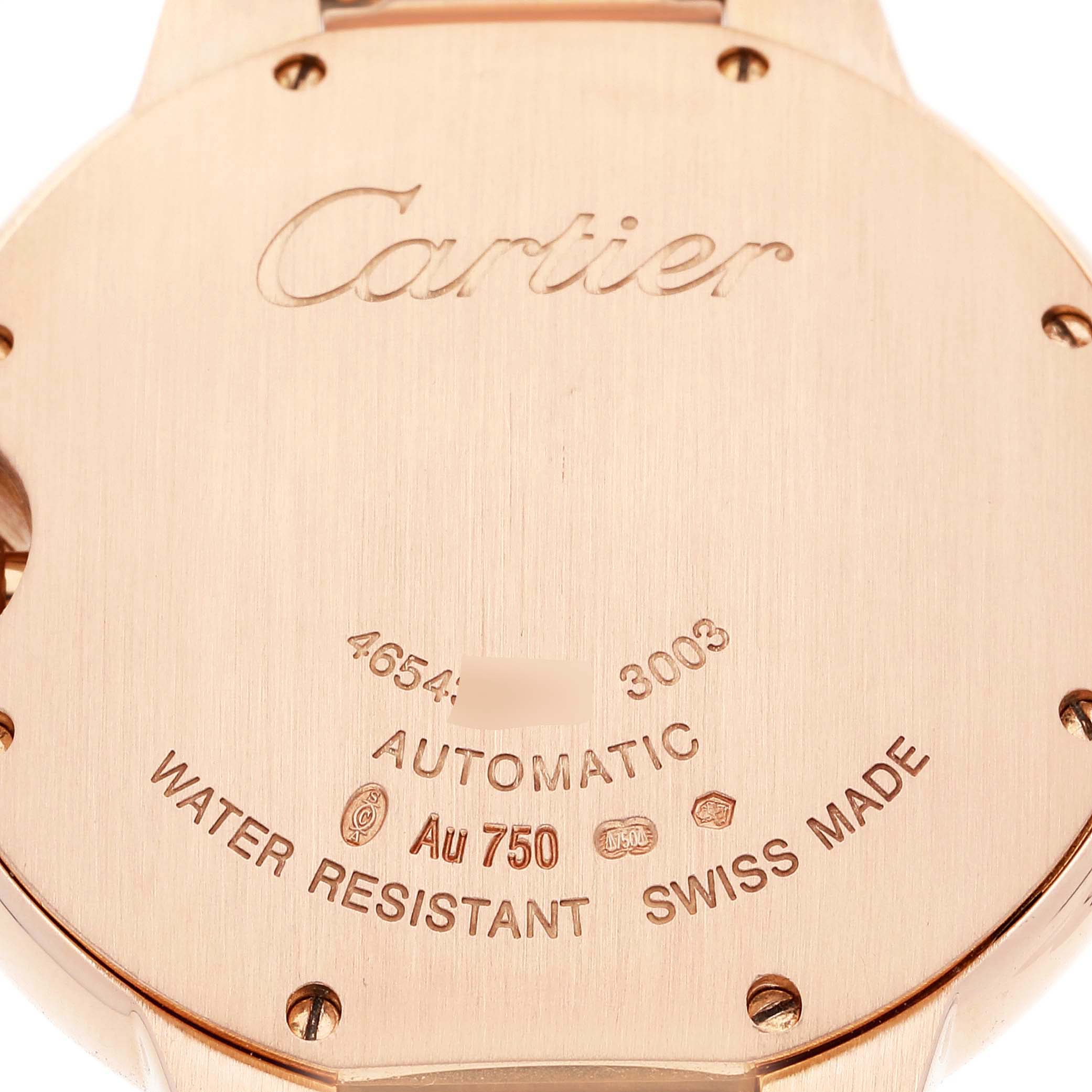 The image shows the back case of the Ballon Bleu model by Cartier, highlighting the engravings and the "Swiss Made" label.