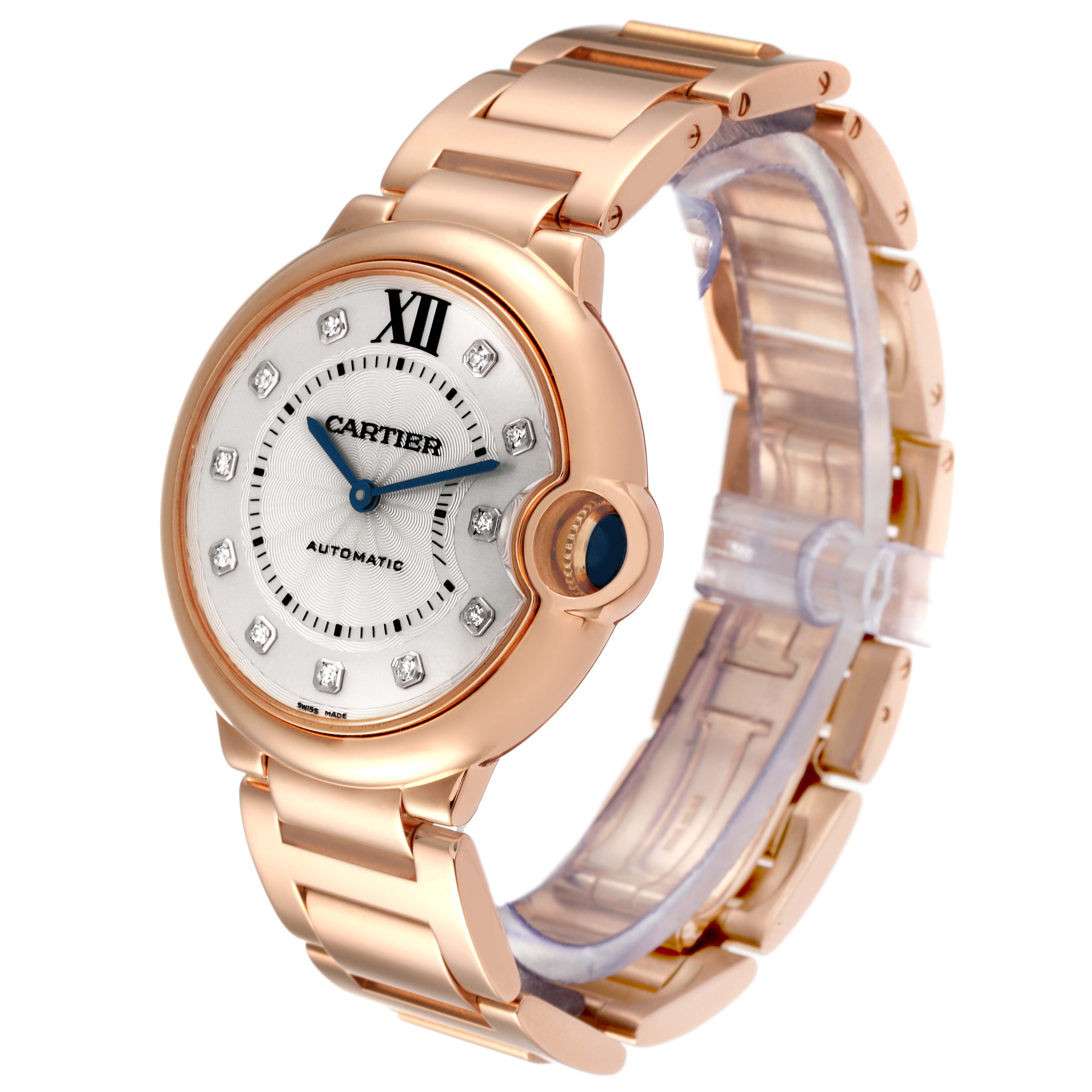 The image shows the Cartier Ballon Bleu WE902026 Women's Rose Gold Silver Dial WE902026 Women's Rose Gold Silver Dial watch from an angled side view, displaying its face, bracelet, crown, and part of the clasp.
