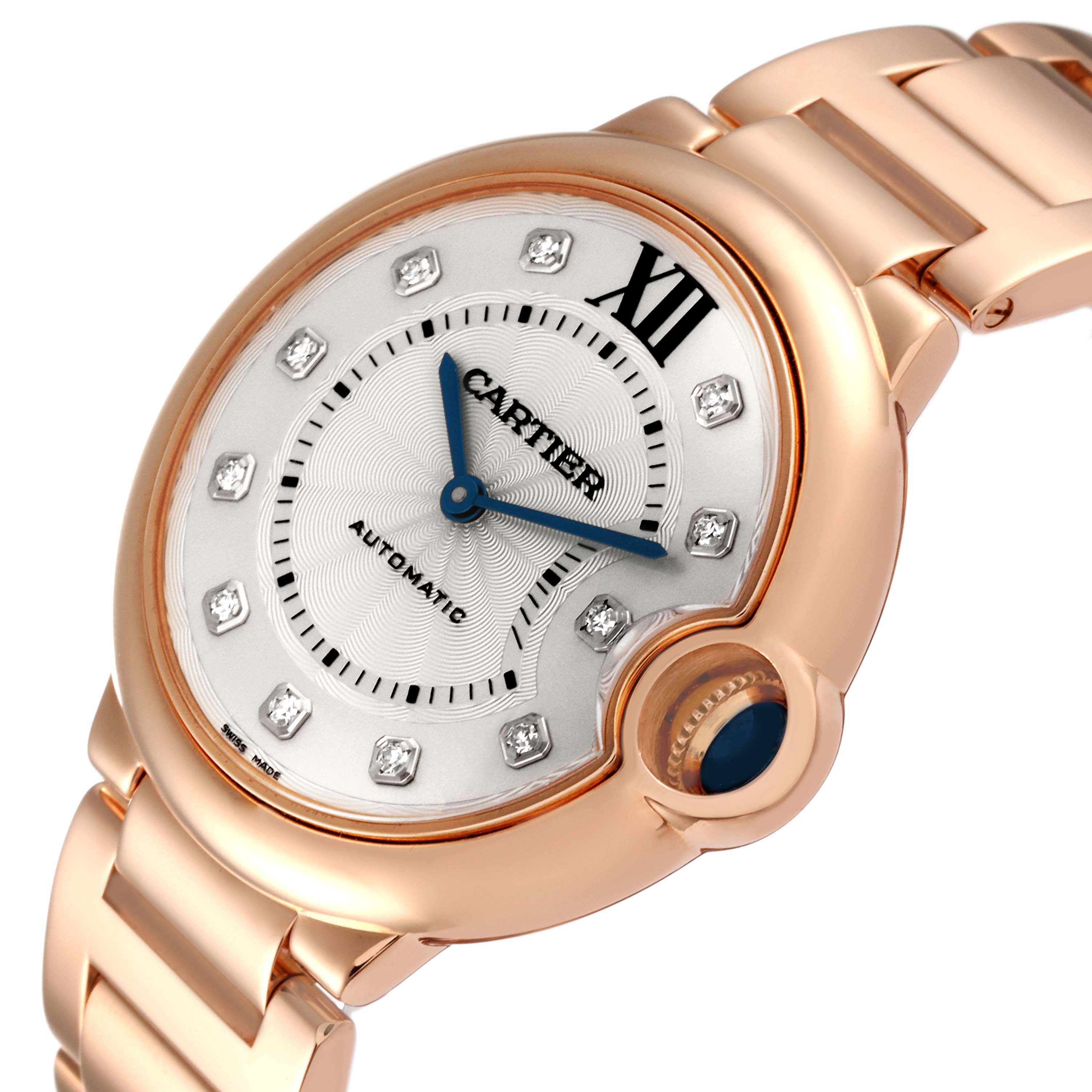 The image shows a close-up view of a Cartier Ballon Bleu WE902026 Women's Rose Gold Silver Dial WE902026 Women's Rose Gold Silver Dial watch focusing on the dial, hands, crown, and part of the bracelet.