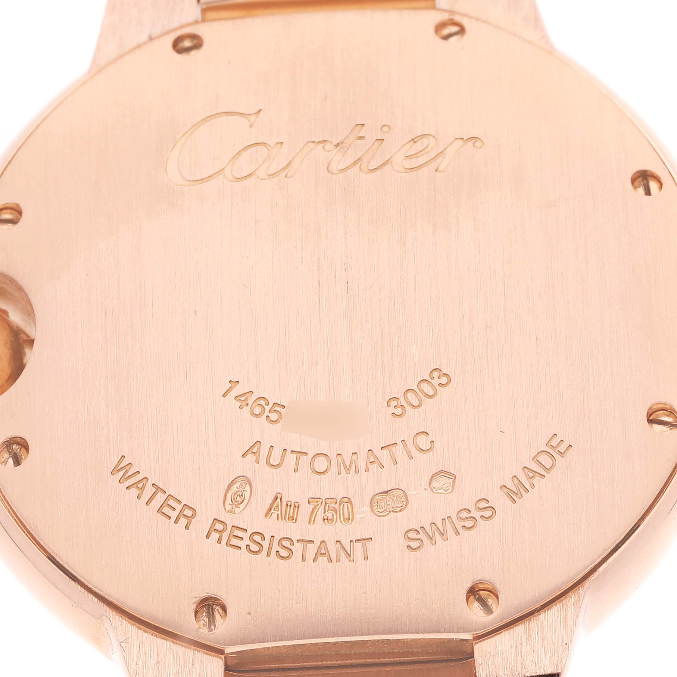 This image shows the back case of a Cartier Ballon Bleu WE902026 Women's Rose Gold Silver Dial WE902026 Women's Rose Gold Silver Dial watch, highlighting engravings and water resistance information.