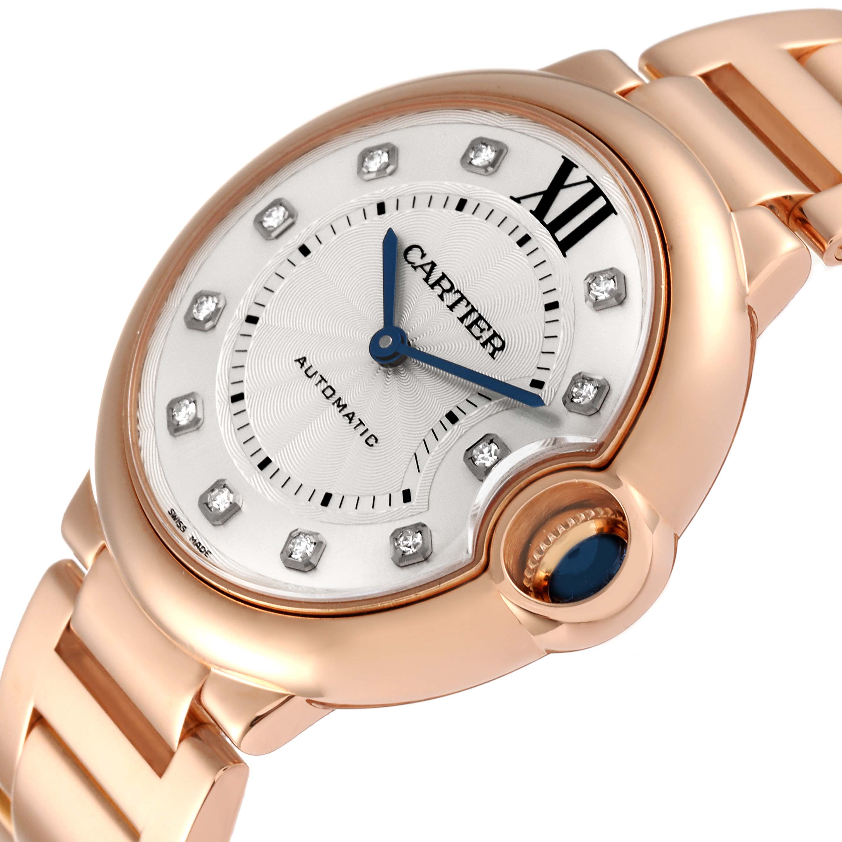 The image shows a close-up of the Ballon Bleu by Cartier, highlighting the dial, hour markers, hands, and part of the bracelet.