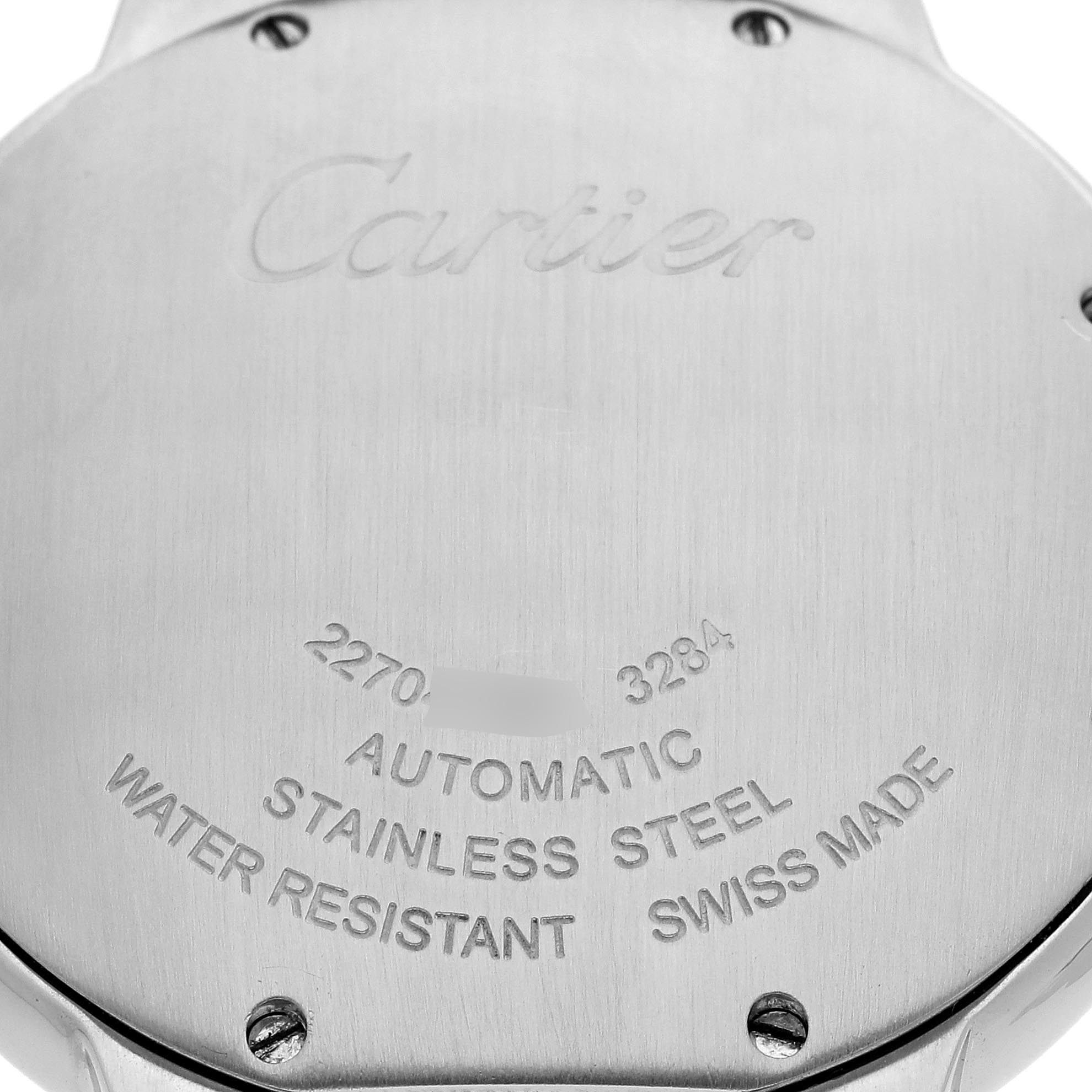 The image shows the back case of a Cartier Ballon Bleu W2BB0012 Women
s Steel and Gold (two tone) Silver Dial W2BB0012 Women
s Steel and Gold (two tone) Silver Dial watch, highlighting its engravings and screws.