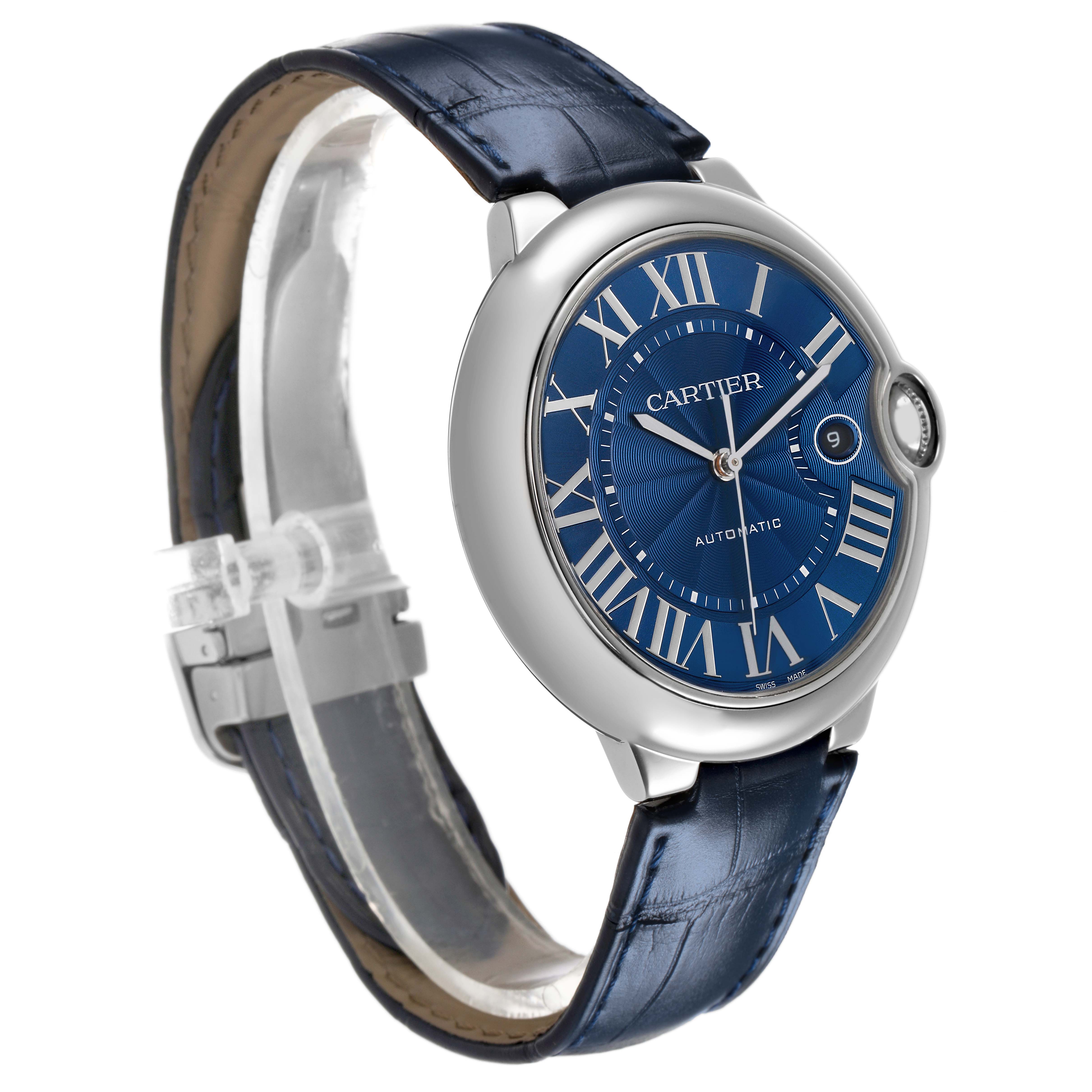 The Cartier Ballon Bleu WSBB0025 Men's Stainless Steel Blue Dial watch is shown from a front-left angle, highlighting its blue dial, roman numerals, and leather strap.