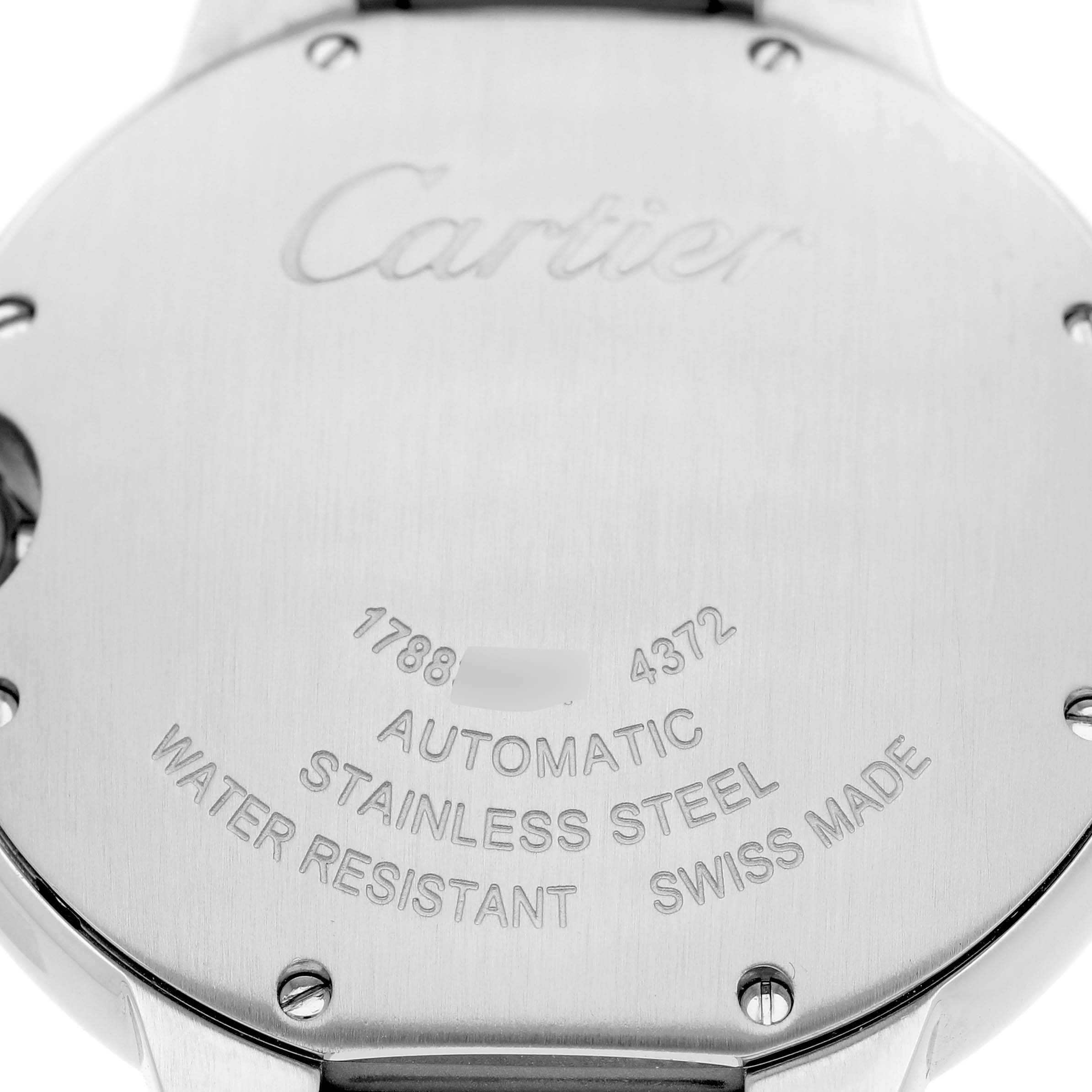 The image shows the back case of the Cartier Ballon Bleu W4BB0036 Women's Stainless Steel Silver Dial watch, highlighting its engravings and material details.