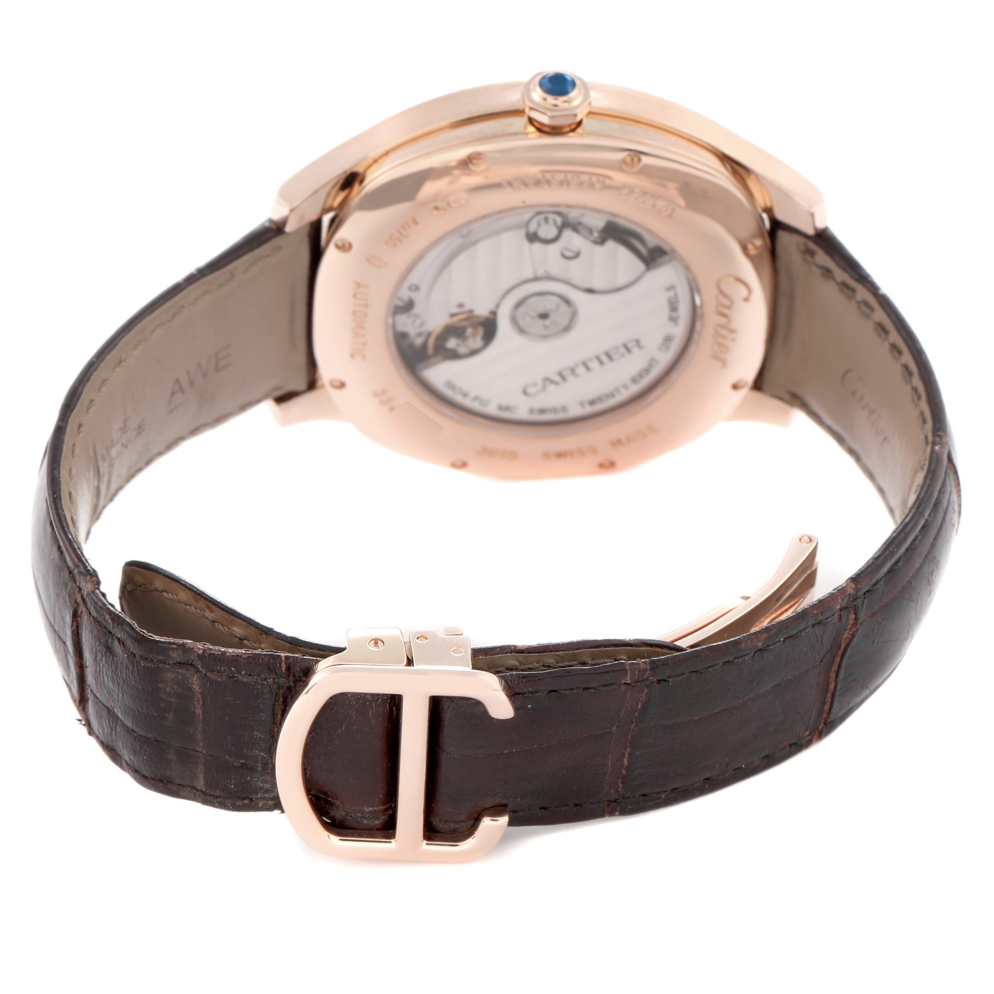 The image shows the back view of a Drive de Cartier watch by Cartier, highlighting the case back, crown, and leather strap.