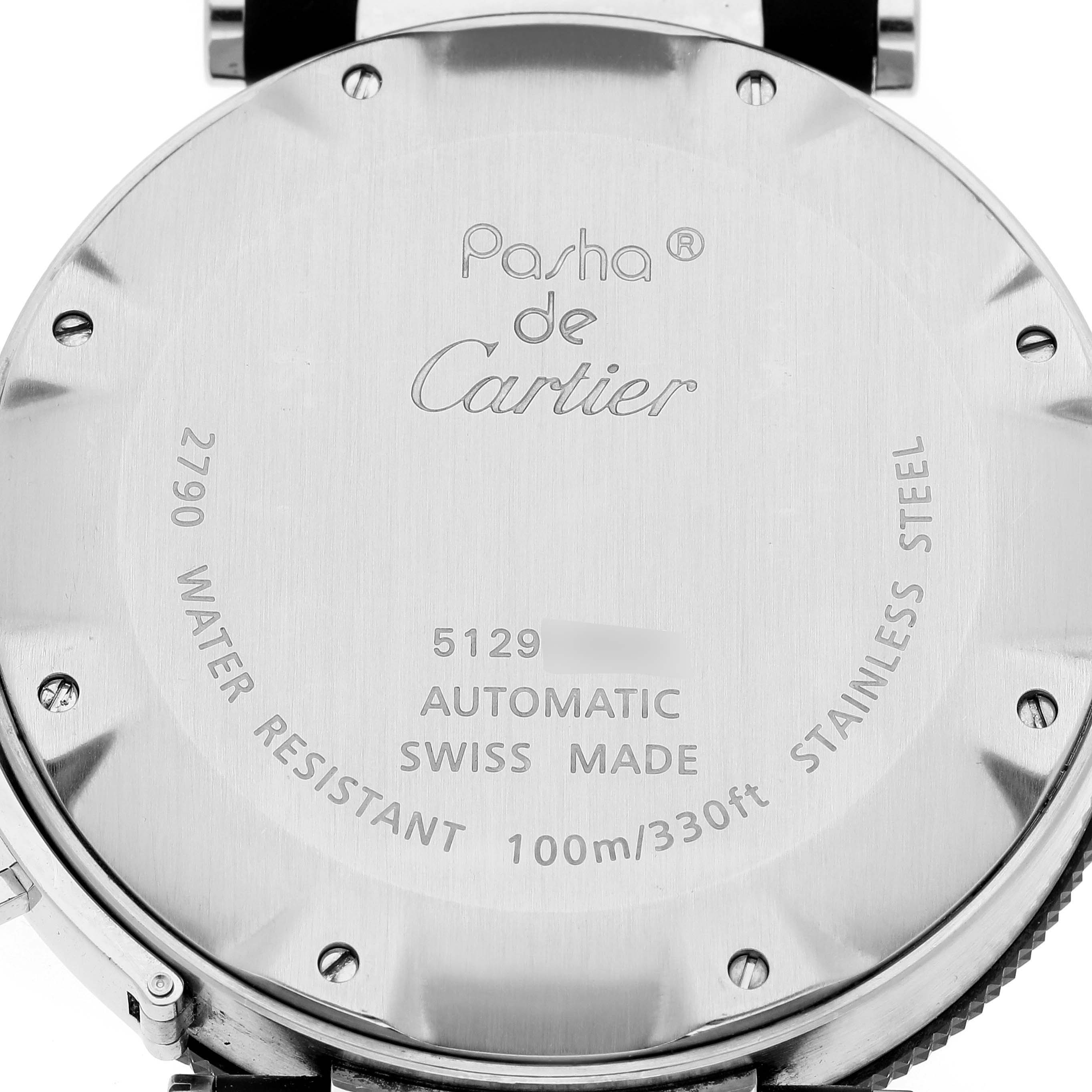 This image shows the back case of a Pasha model Cartier watch, displaying engravings and specifications.