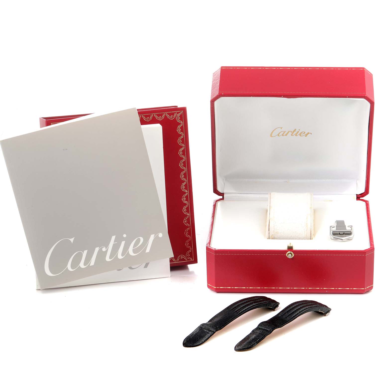 The image shows the Cartier Roadster W62006X6 Men
s Stainless Steel Silver Dial W62006X6 Men
s Stainless Steel Silver Dial watch
s box, booklet, extra straps, and watch holder.