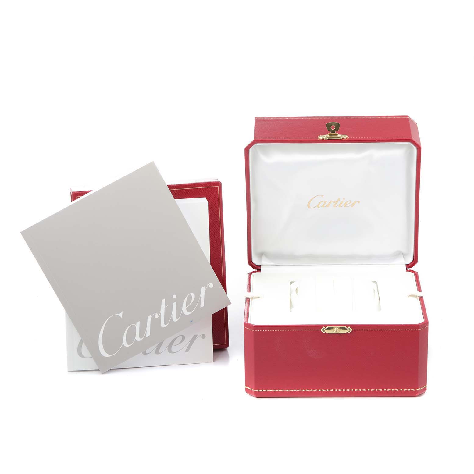 The image shows an open Cartier Santos W20073X8 Men
s Stainless Steel Silver Dial W20073X8 Men
s Stainless Steel Silver Dial watch box and a care booklet, viewed from the front.