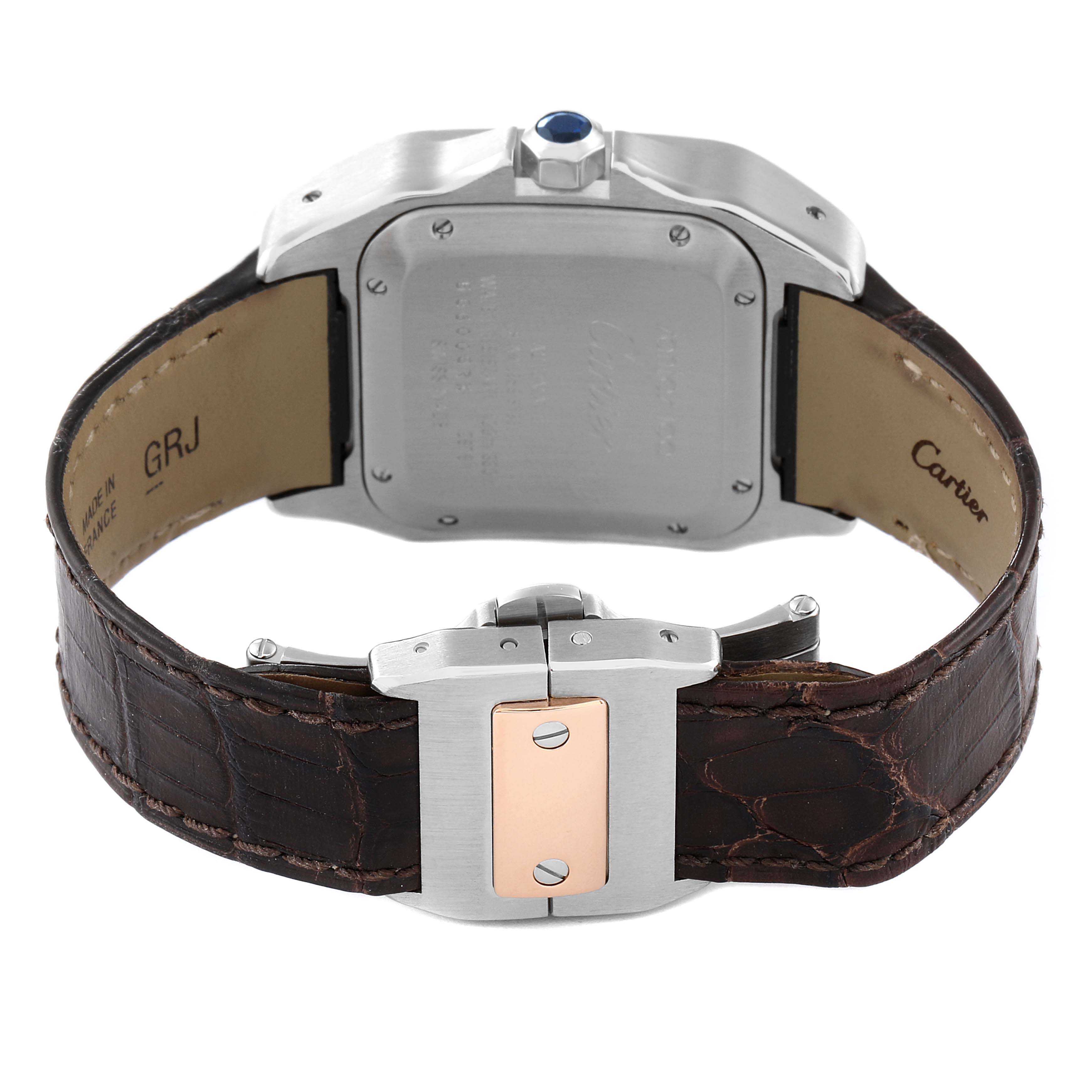 This image shows the back case, crown, and leather strap of a Cartier Santos W20106X8 Men's Steel and Gold (two tone) Silver Dial W20106X8 Men's Steel and Gold (two tone) Silver Dial model watch, viewed from the rear.