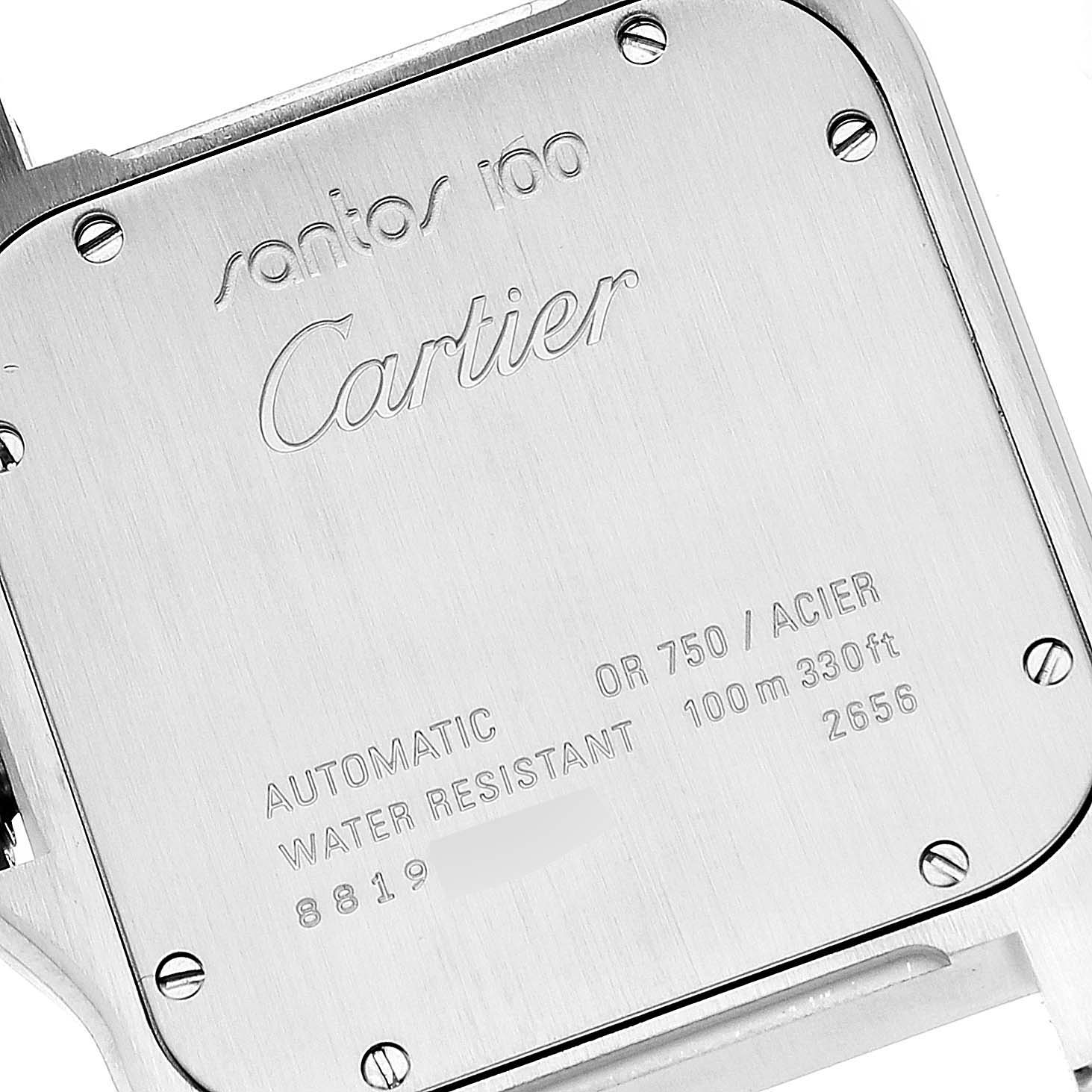 The image shows the back case of a Cartier Santos W20072X7 Men's Steel and Gold (two tone) Silver Dial W20072X7 Men's Steel and Gold (two tone) Silver Dial 100 watch, highlighting its engravings and screws.