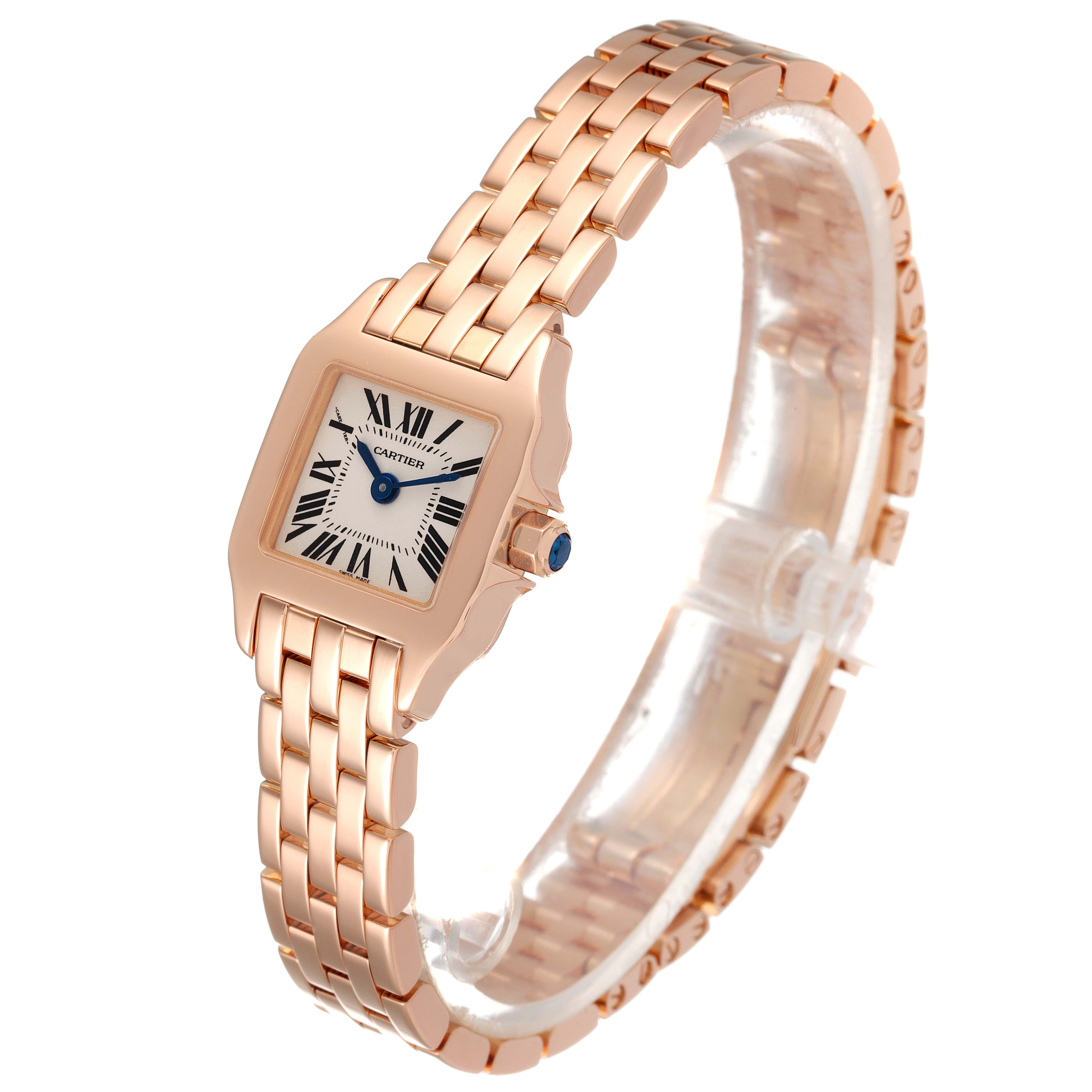 The image shows a side angle of the Cartier Santos Demoiselle W25077X9 Women
s Rose Gold Silver Dial W25077X9 Women
s Rose Gold Silver Dial watch, highlighting its rose gold case, bracelet, and dial.
