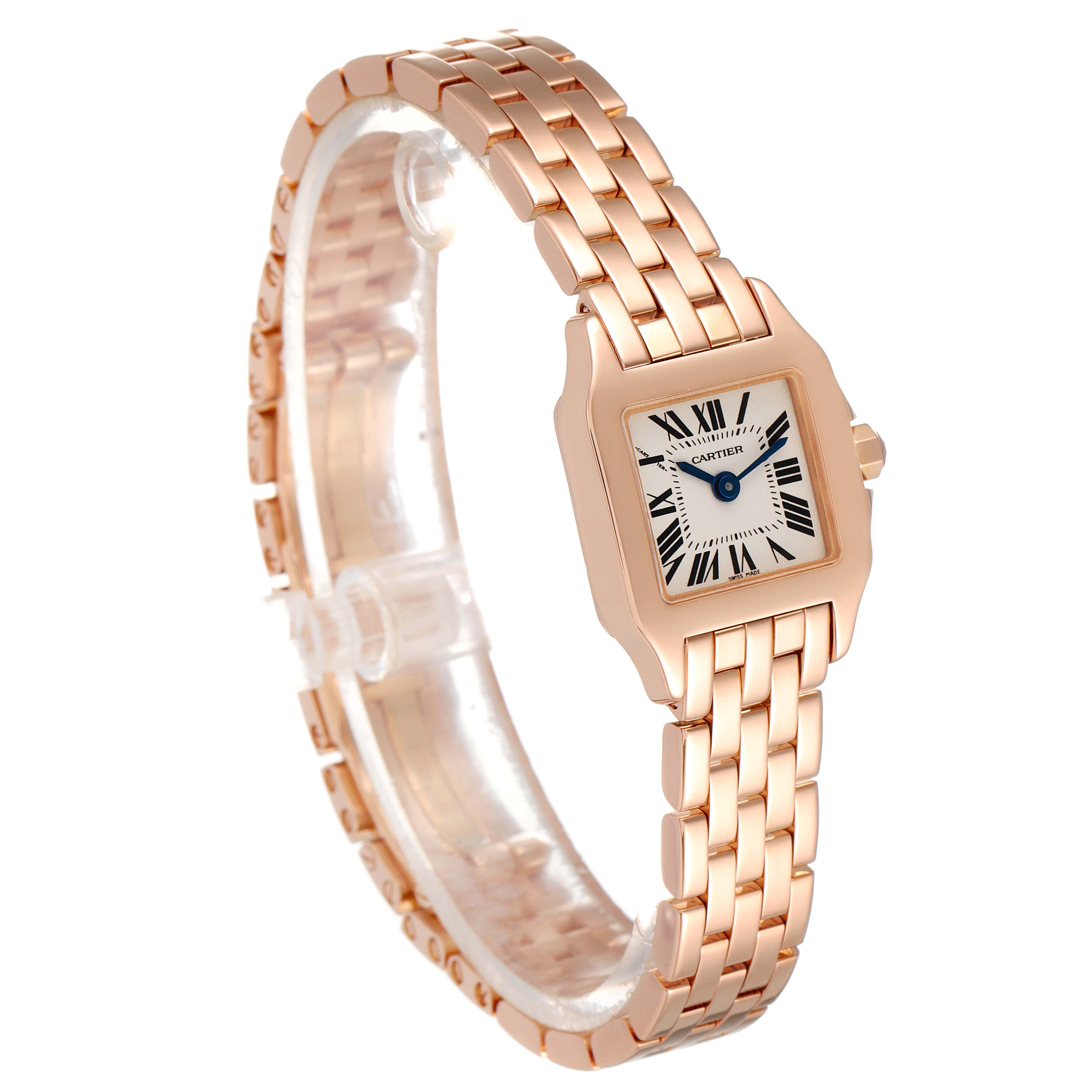 The image shows a Cartier Santos Demoiselle W25077X9 Women
s Rose Gold Silver Dial W25077X9 Women
s Rose Gold Silver Dial watch at a slight angle, highlighting its gold bracelet and square face.