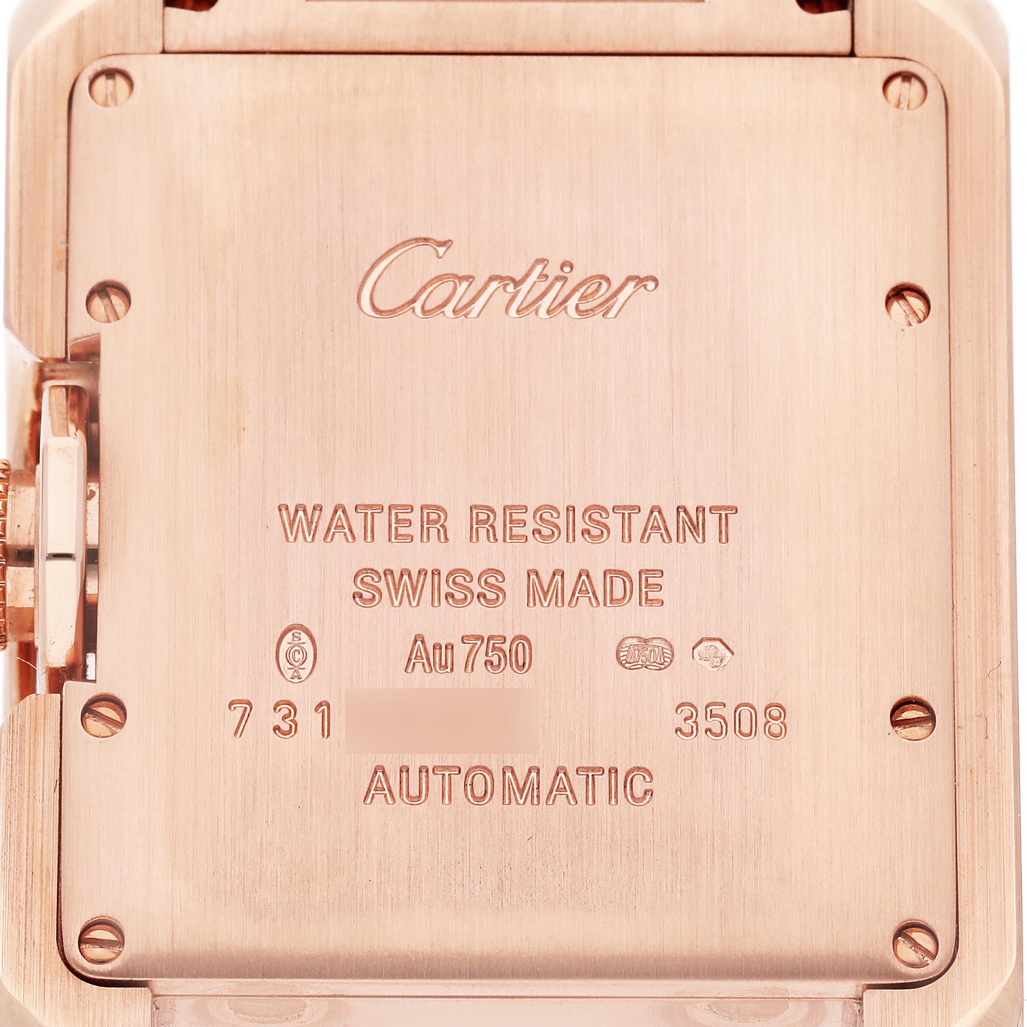 The image shows the back case of the Cartier Tank Anglaise W5310003 Men
s Rose Gold Silver Dial W5310003 Men
s Rose Gold Silver Dial watch with inscriptions detailing its specifications.