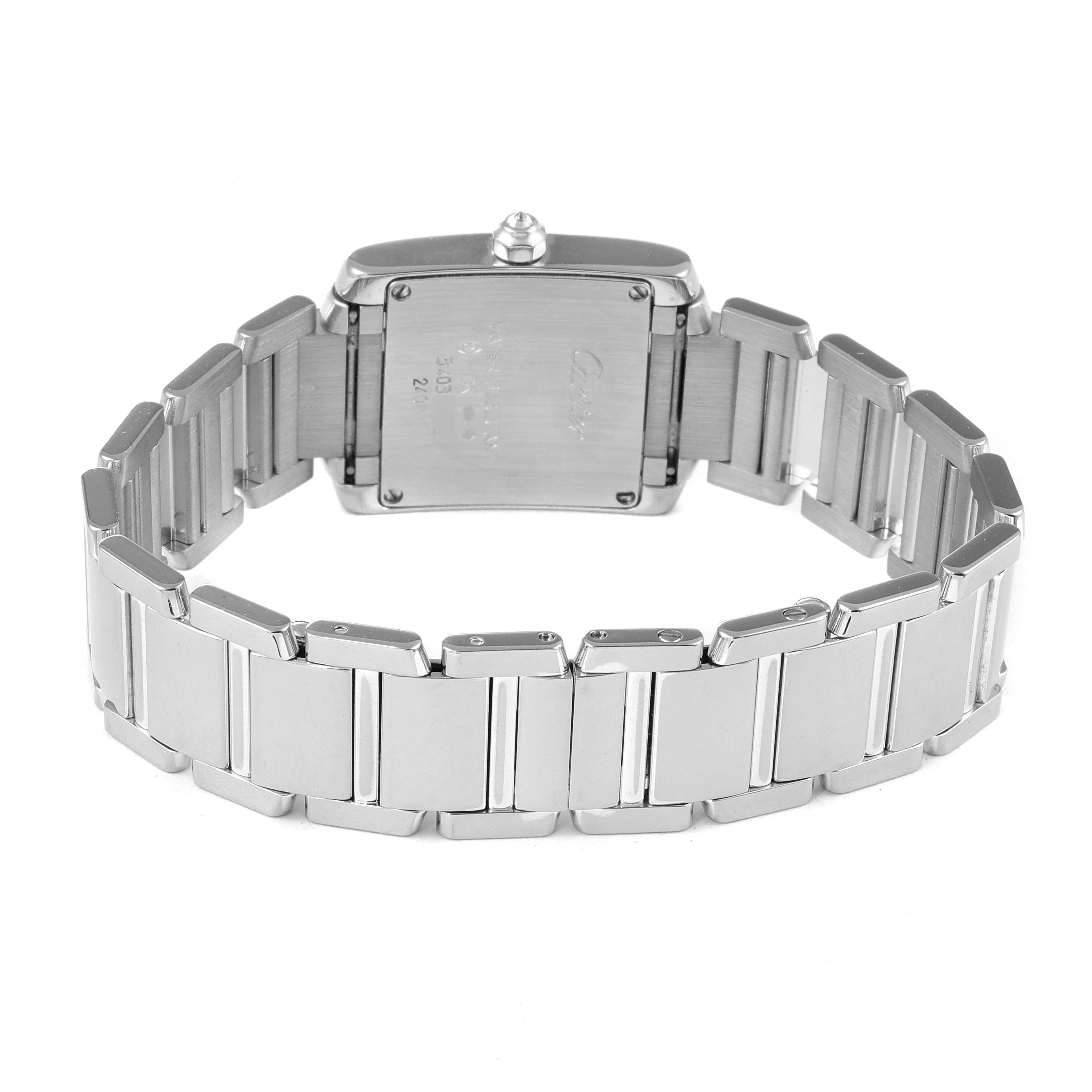 This image shows the back side and stainless steel bracelet of a Cartier Tank Française watch.