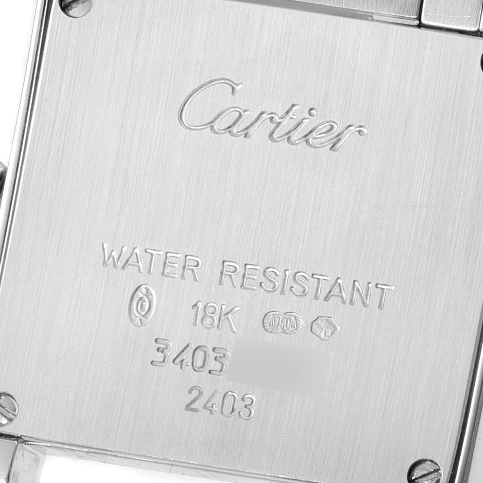 The image shows the back casing of the Tank Francaise model by Cartier, highlighting its engravings and specifications.