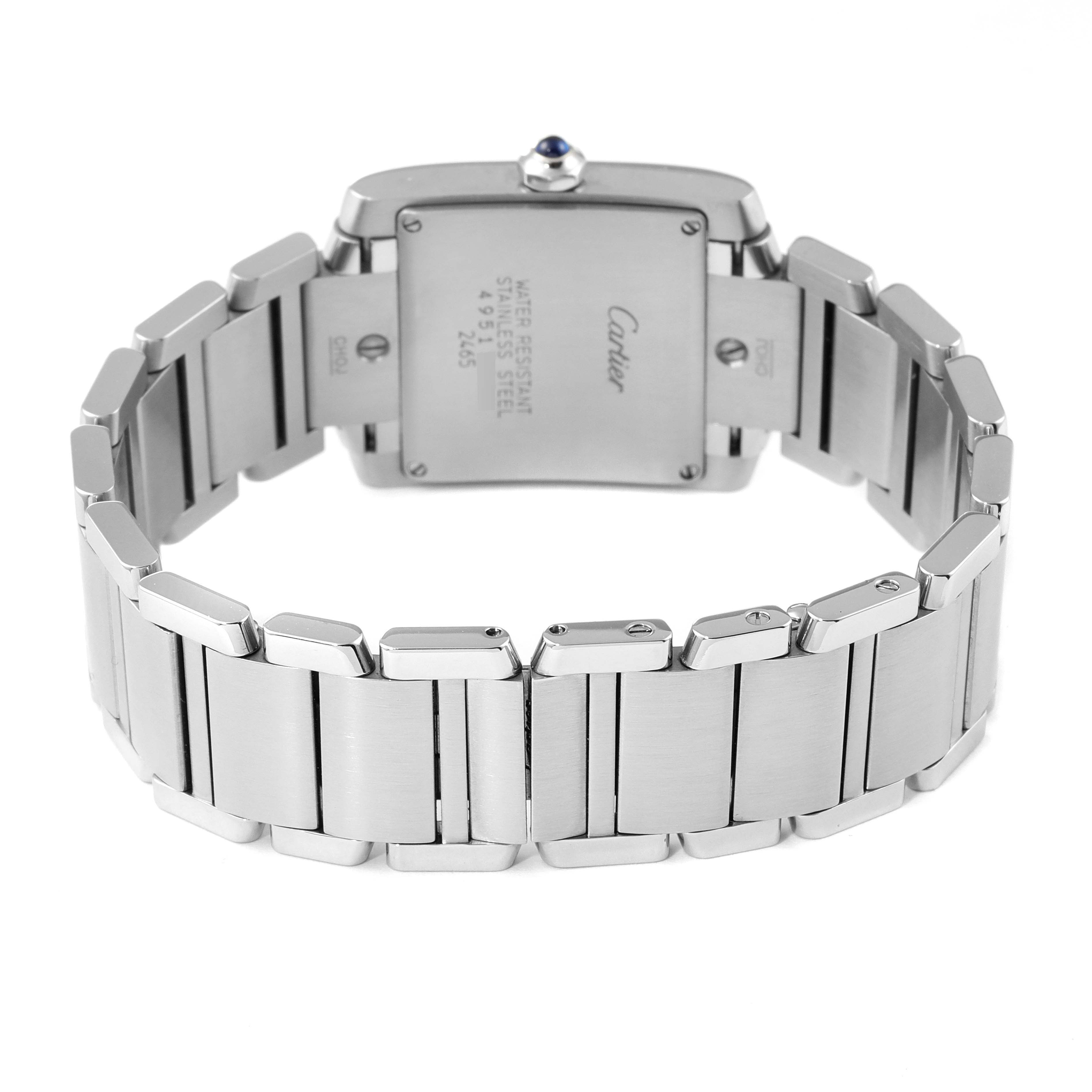 The image shows the back view of a stainless steel Cartier Tank Francaise W51011Q3 Women's Stainless Steel Silver Dial W51011Q3 Women's Stainless Steel Silver Dial watch, focusing on the case back and bracelet.