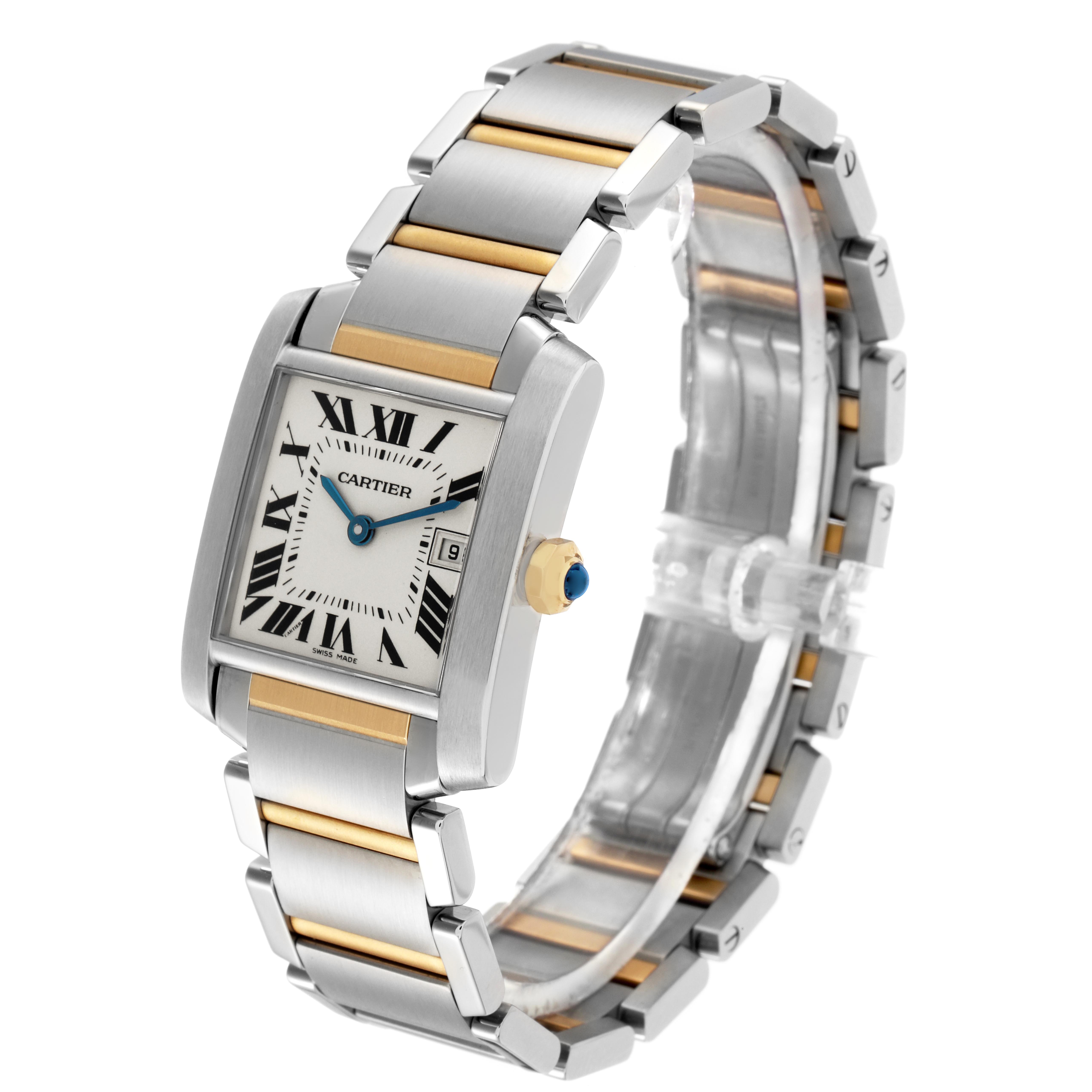 The Cartier Tank Francaise W51012Q4 Women
s Steel and Gold (two tone) Silver Dial W51012Q4 Women
s Steel and Gold (two tone) Silver Dial watch is shown at a three-quarter angle, highlighting its silver and gold bracelet, rectangular face, and blue cabochon crown.