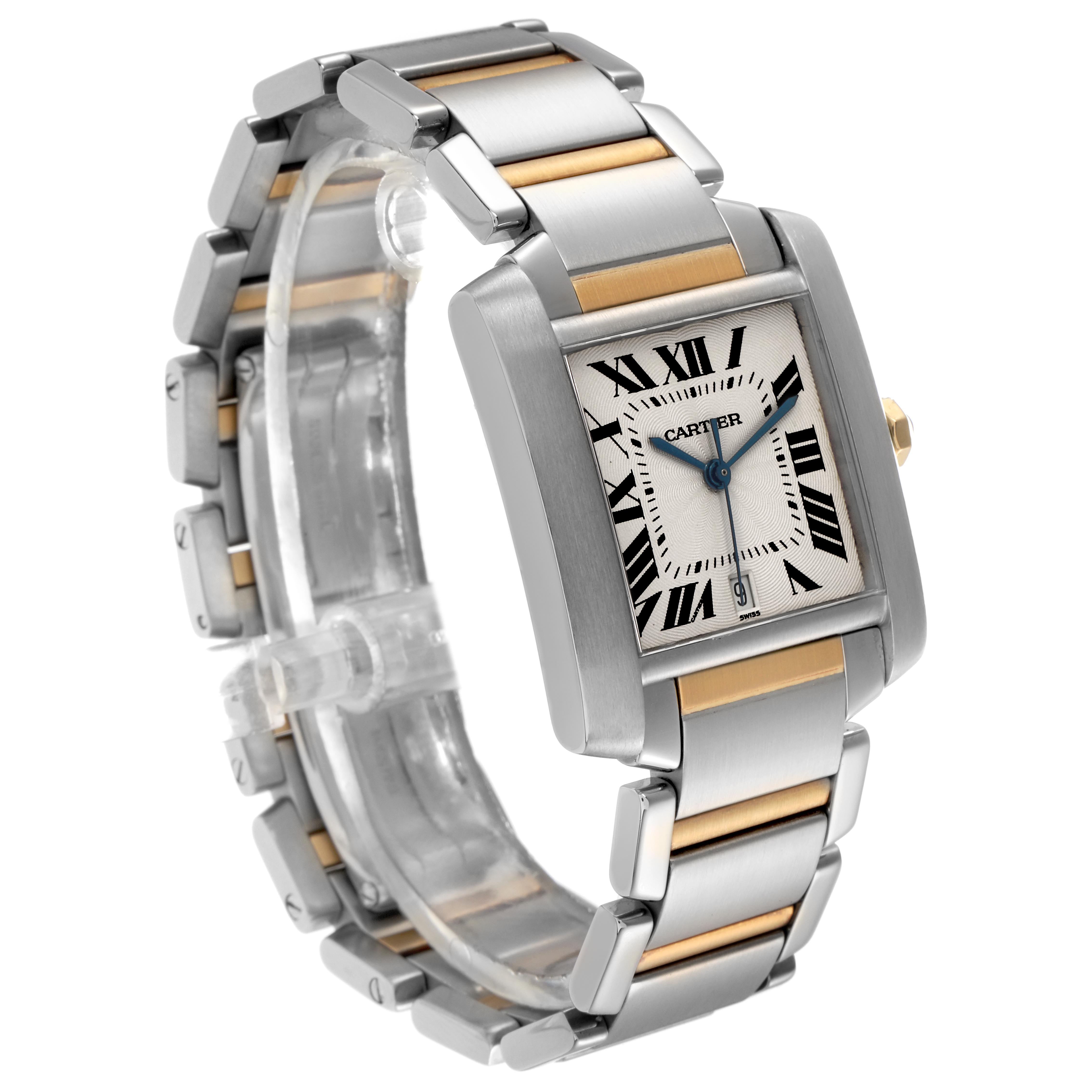 The Cartier Tank Française watch is shown at a three-quarter angle, highlighting its rectangular face and metal bracelet.