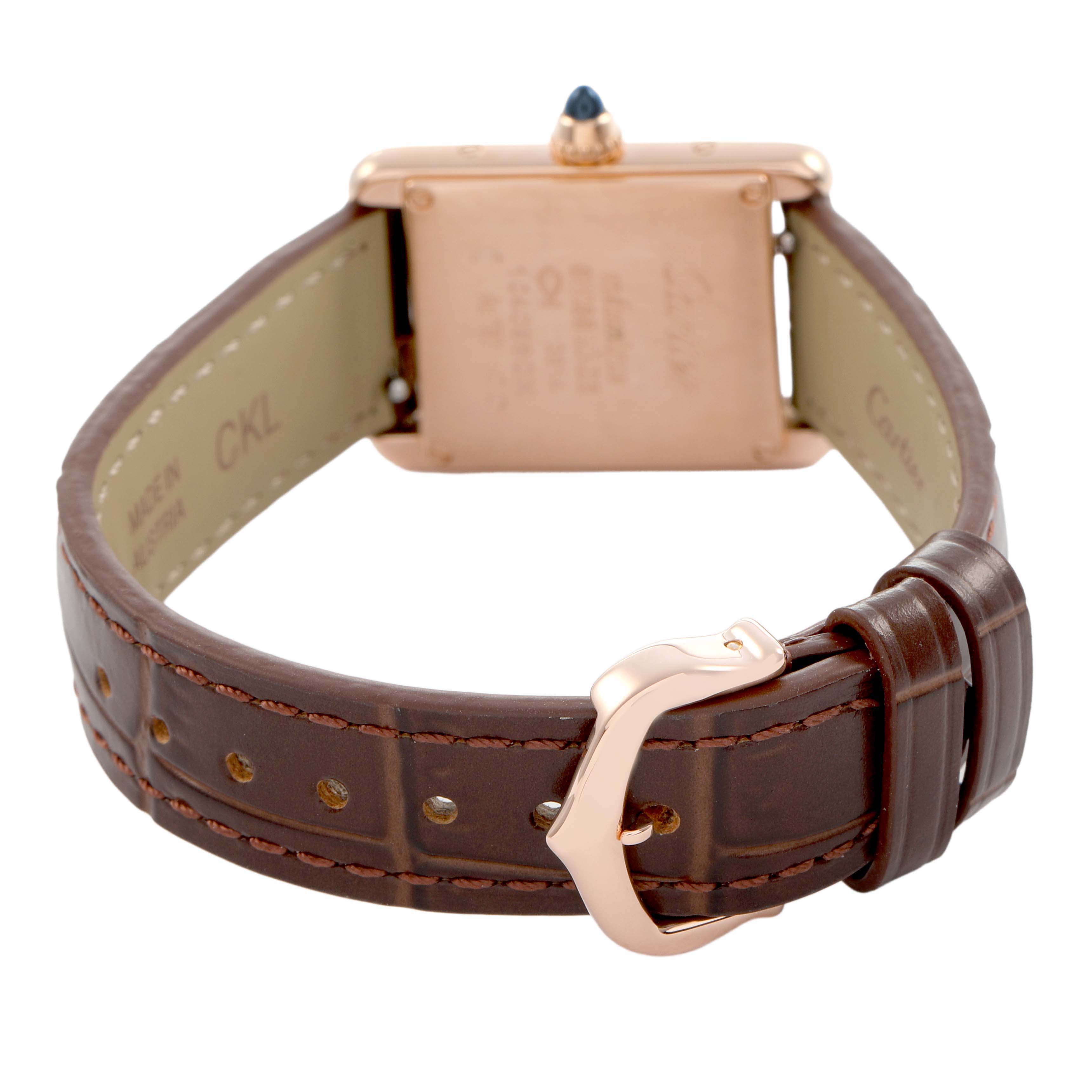 The Cartier Tank Louis WGTA0010 Women's Rose Gold Silver Dial watch is shown from the rear, highlighting the case back, crown with sapphire, and brown leather strap.