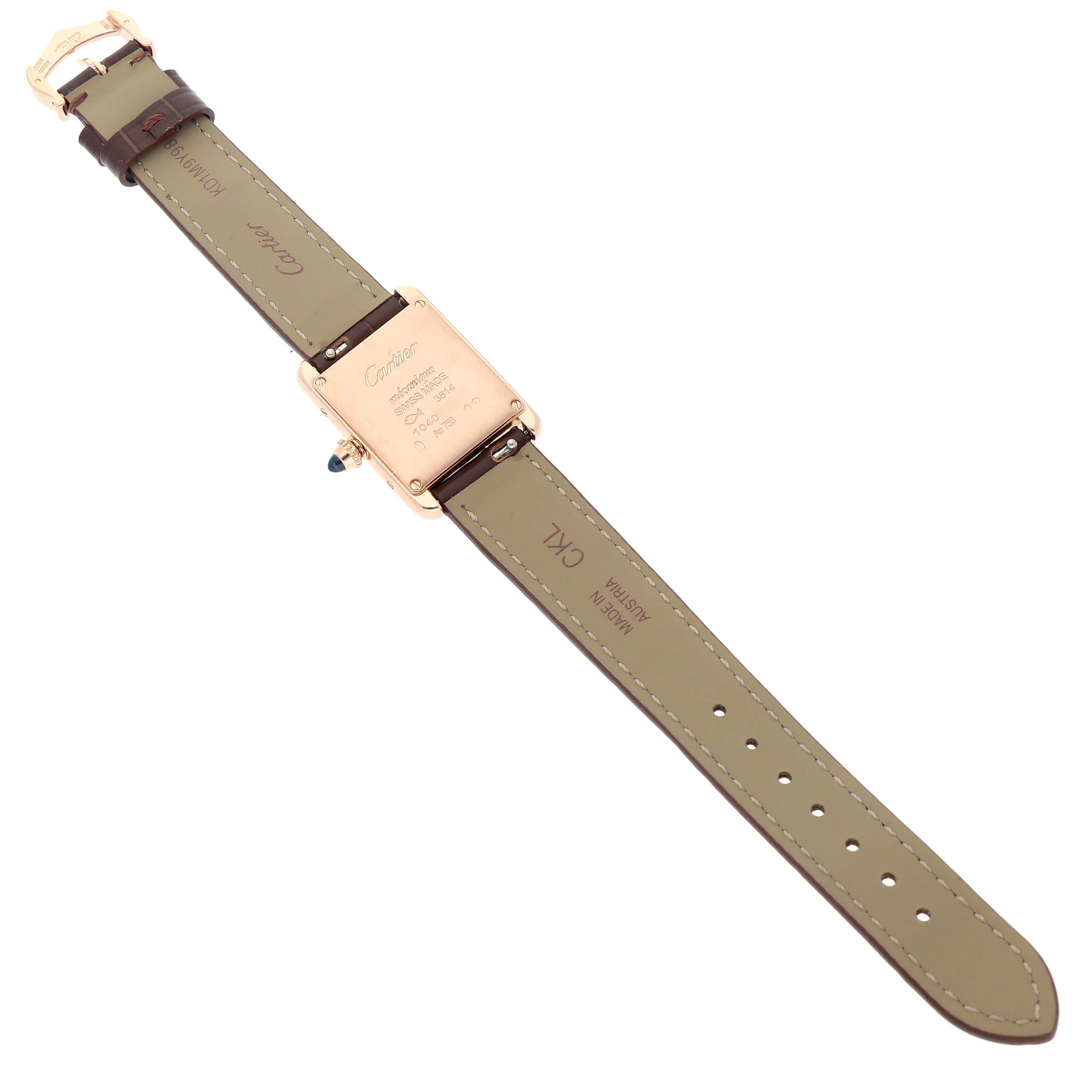 The Cartier Tank Louis WGTA0010 Women's Rose Gold Silver Dial watch is shown from the back, displaying the case back, strap, and clasp.