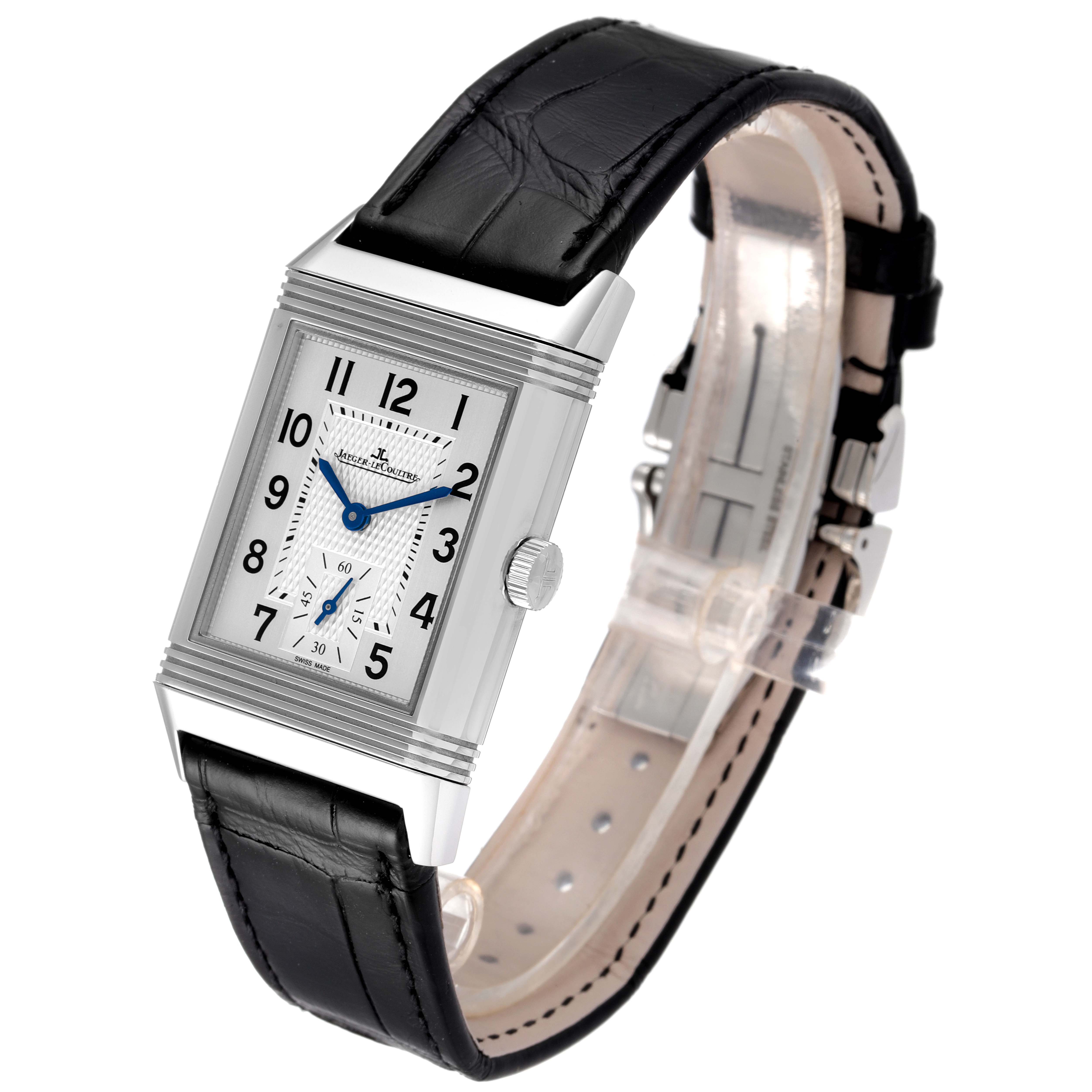 The image shows a Jaeger-LeCoultre Reverso watch from a front angle, displaying its rectangular face, black leather strap, and side crown.