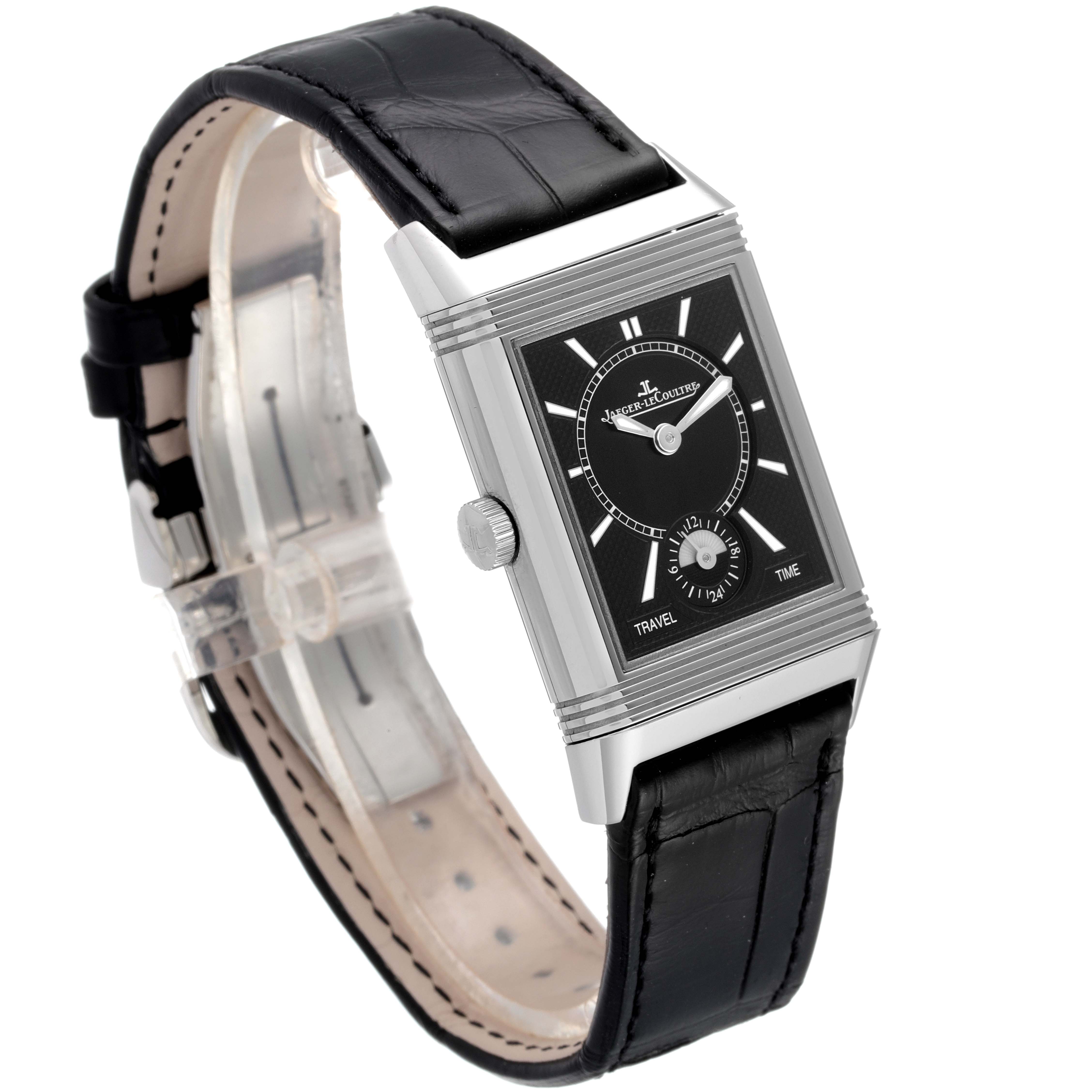 The Jaeger LeCoultre Reverso Q3848420 Men's Stainless Steel Silver Dial Q3848420 Men's Stainless Steel Silver Dial watch is shown at an angled view, featuring the black dial, rectangular case, crown, and black leather strap.
