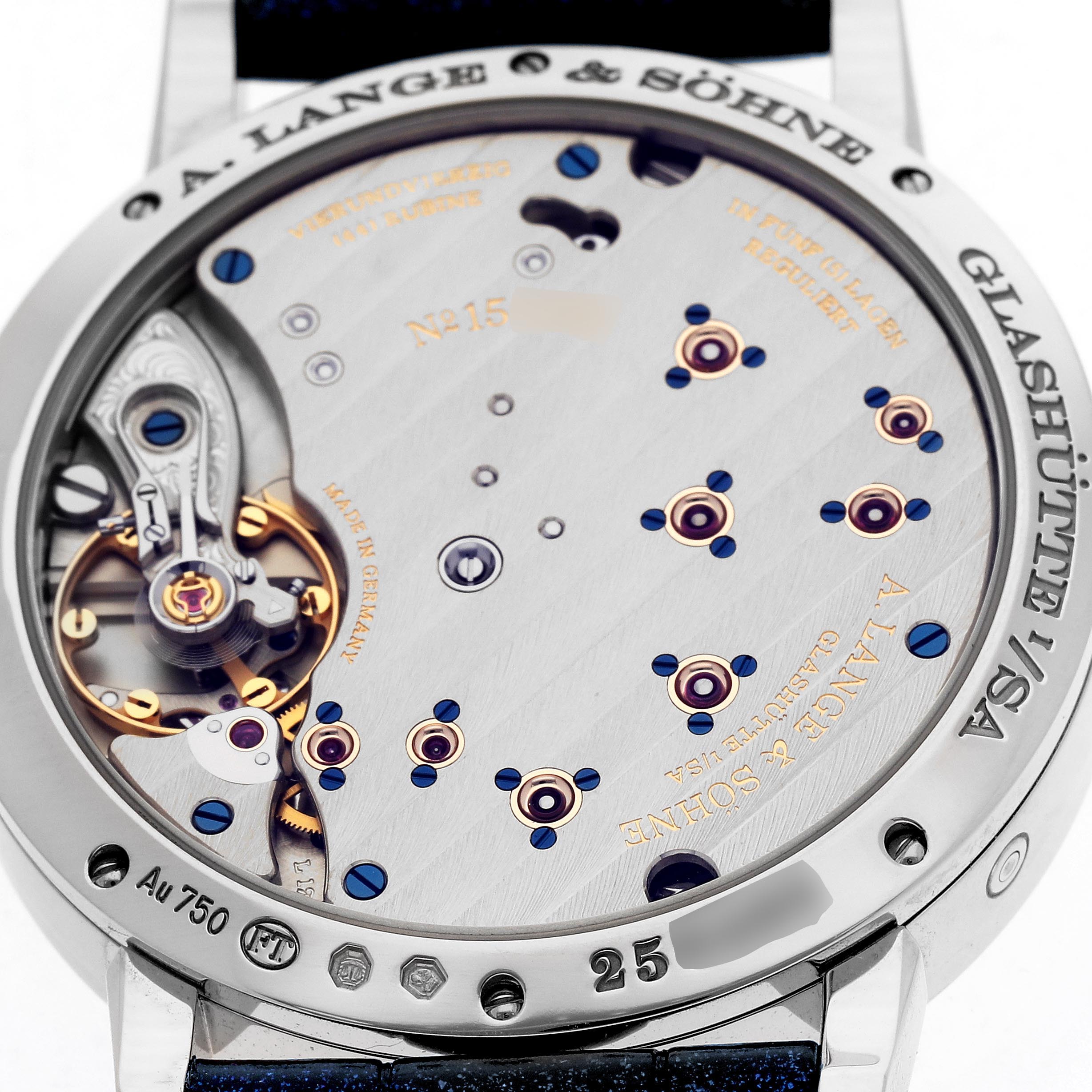 The image shows the caseback of an A. Lange 
Sohne Lange 1 182.086/LSLS823AX Men
s White Gold Blue Dial watch, highlighting the intricate movement and engraved details.