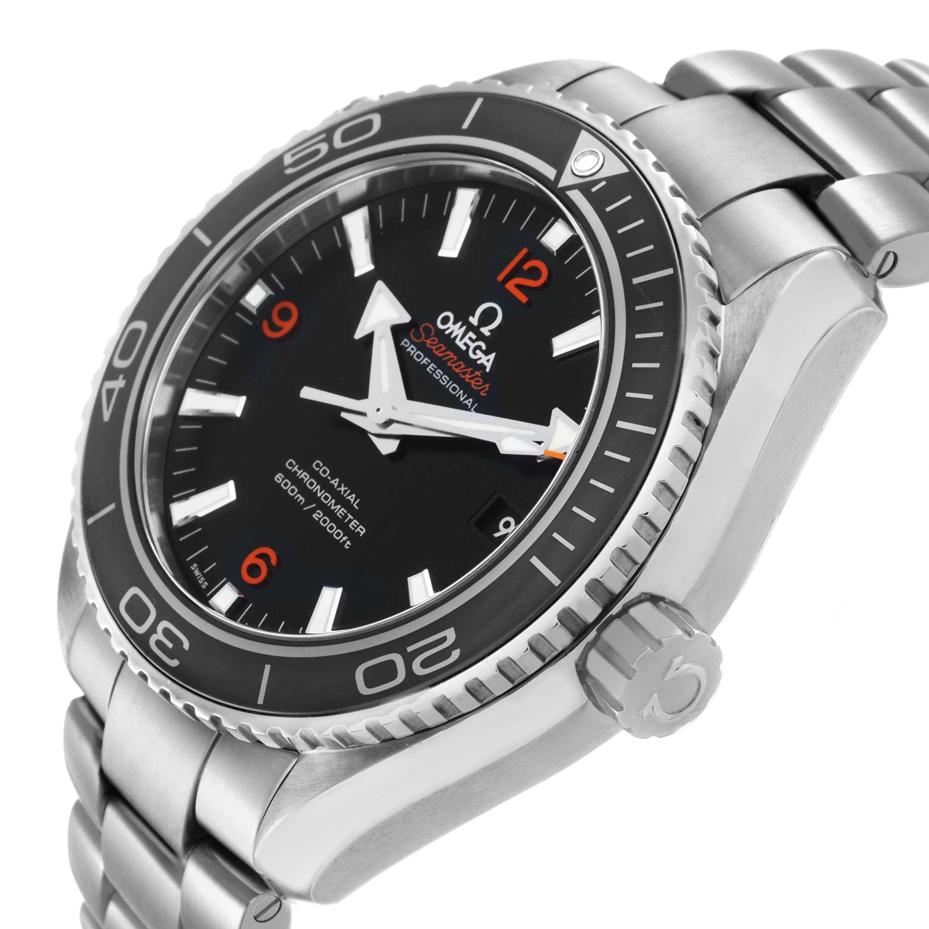 The Omega Planet Ocean 232.30.46.21.01.003 Men's Stainless Steel Black Dial watch is shown at a tilted angle highlighting the face, bezel, crown, and bracelet.