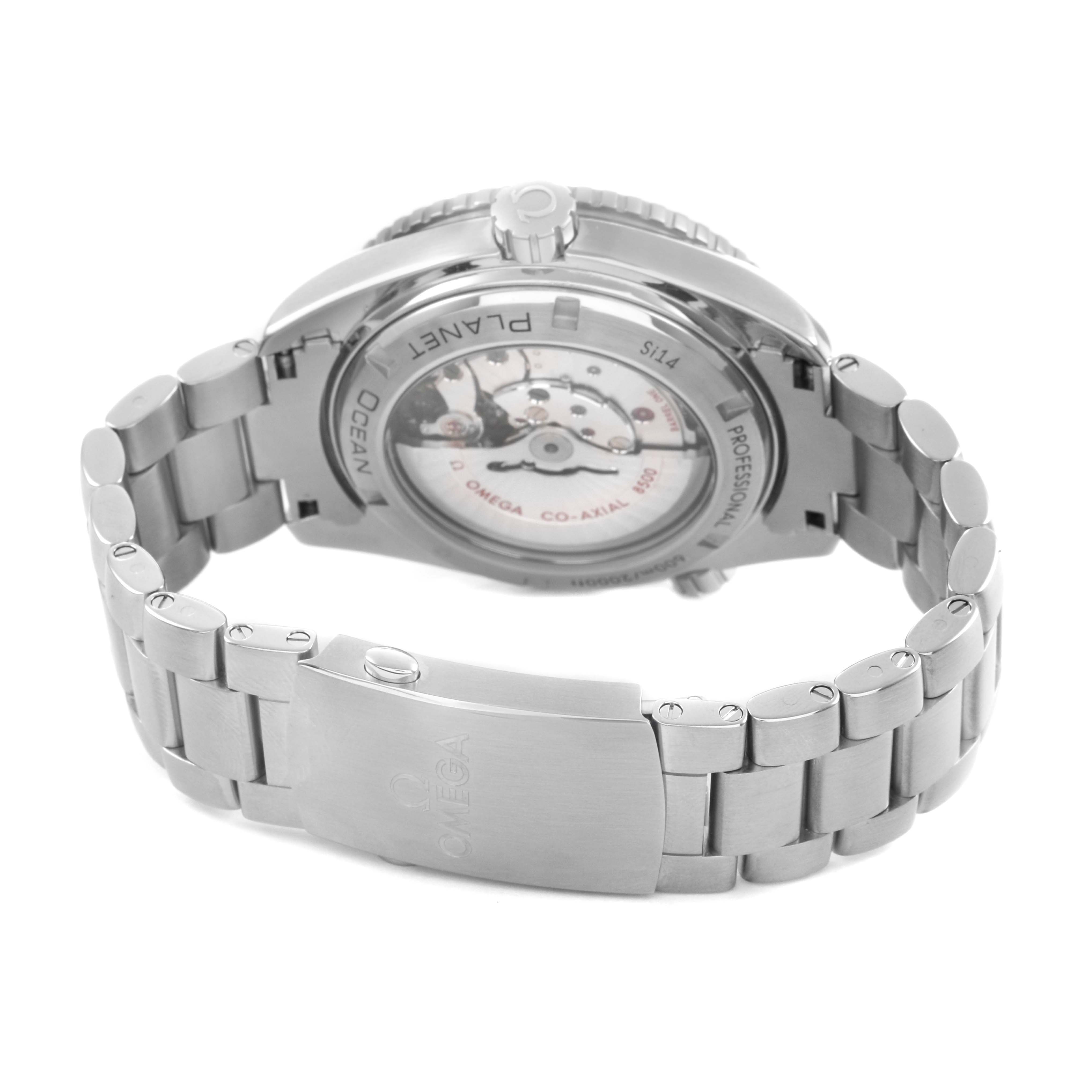 The image shows the back view of an Omega Planet Ocean 232.30.46.21.01.003 Men's Stainless Steel Black Dial watch, highlighting the bracelet and transparent case back.