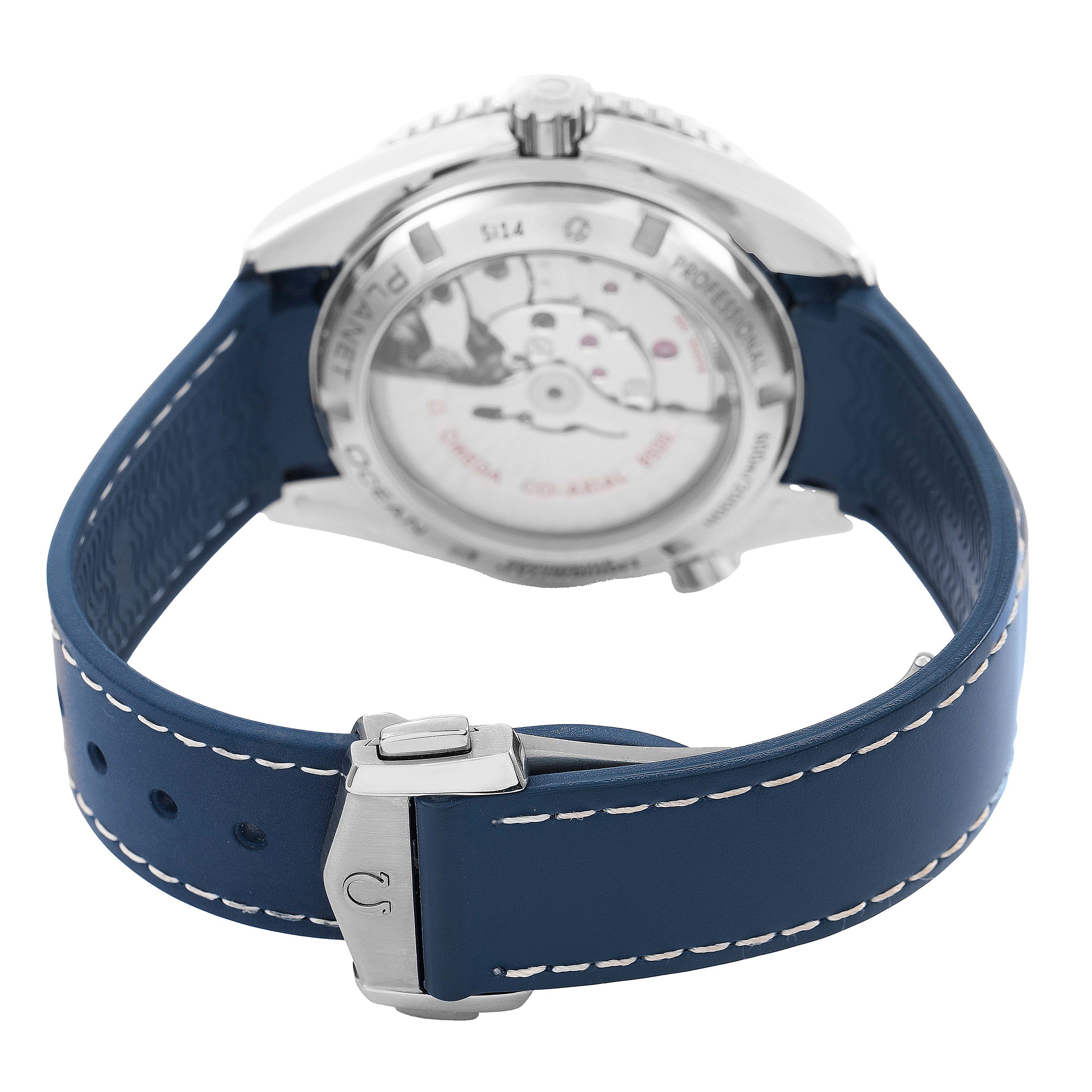 The image shows the Omega Planet Ocean 232.92.42.21.03.001 Men's Titanium Blue Dial watch from a rear angle, highlighting the case back and blue strap with a clasp.