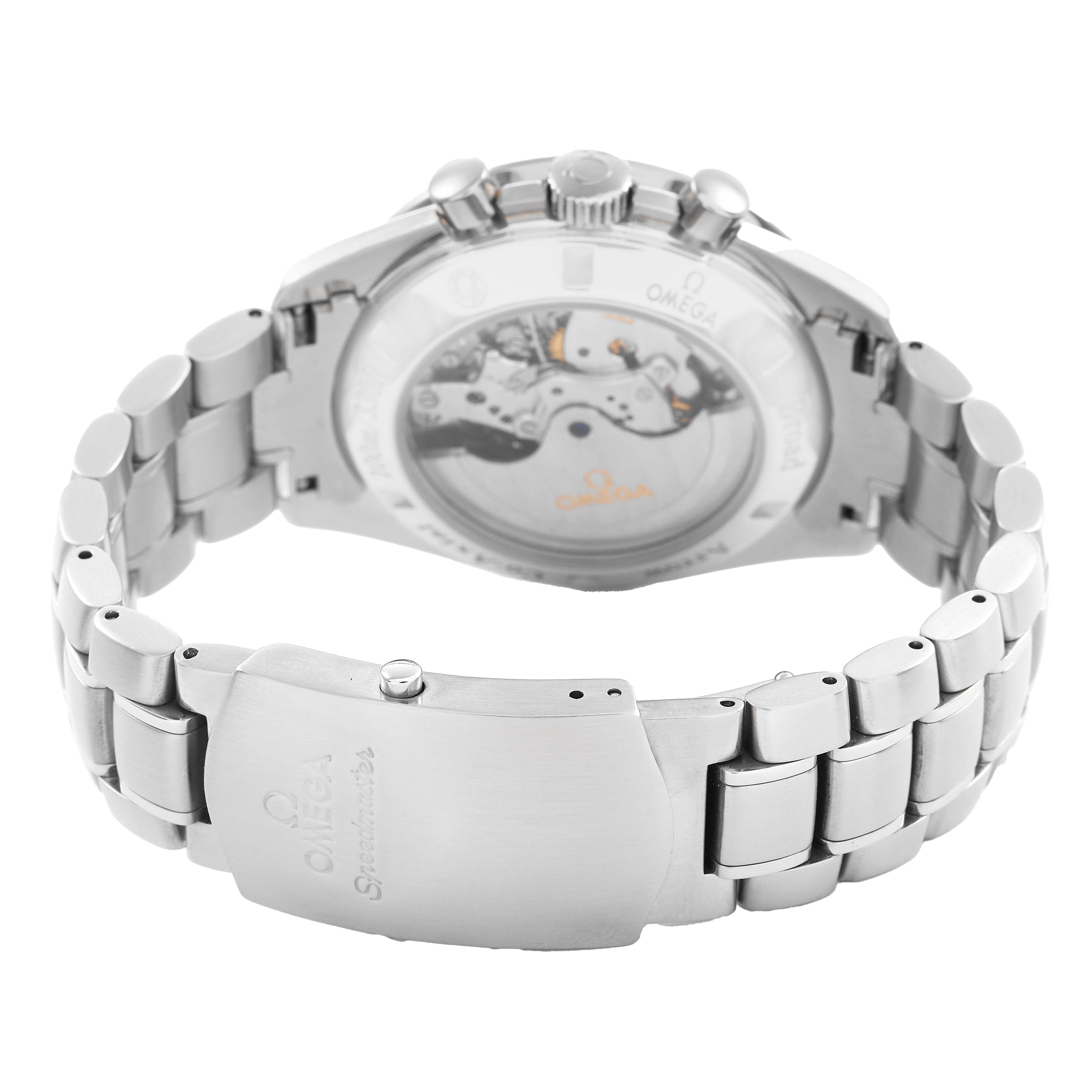 The Omega Speedmaster 321.10.42.50.01.001 Men's Stainless Steel Black Dial watch is shown from the back, highlighting the transparent case back and stainless steel bracelet with clasp.