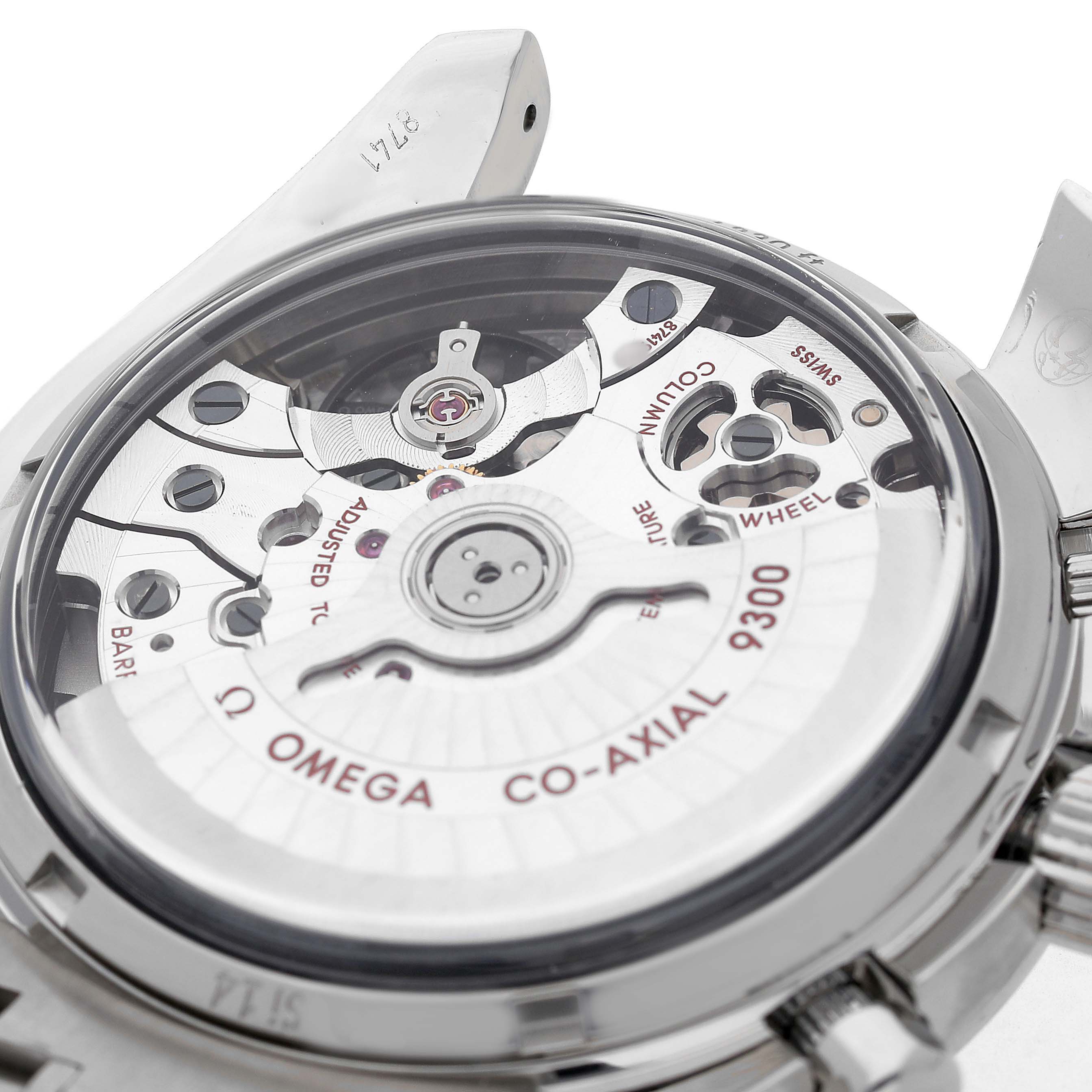 The image shows the back view of an Omega Speedmaster 311.30.44.51.01.002 Men's Stainless Steel Black Dial, revealing the Co-Axial 9300 movement.