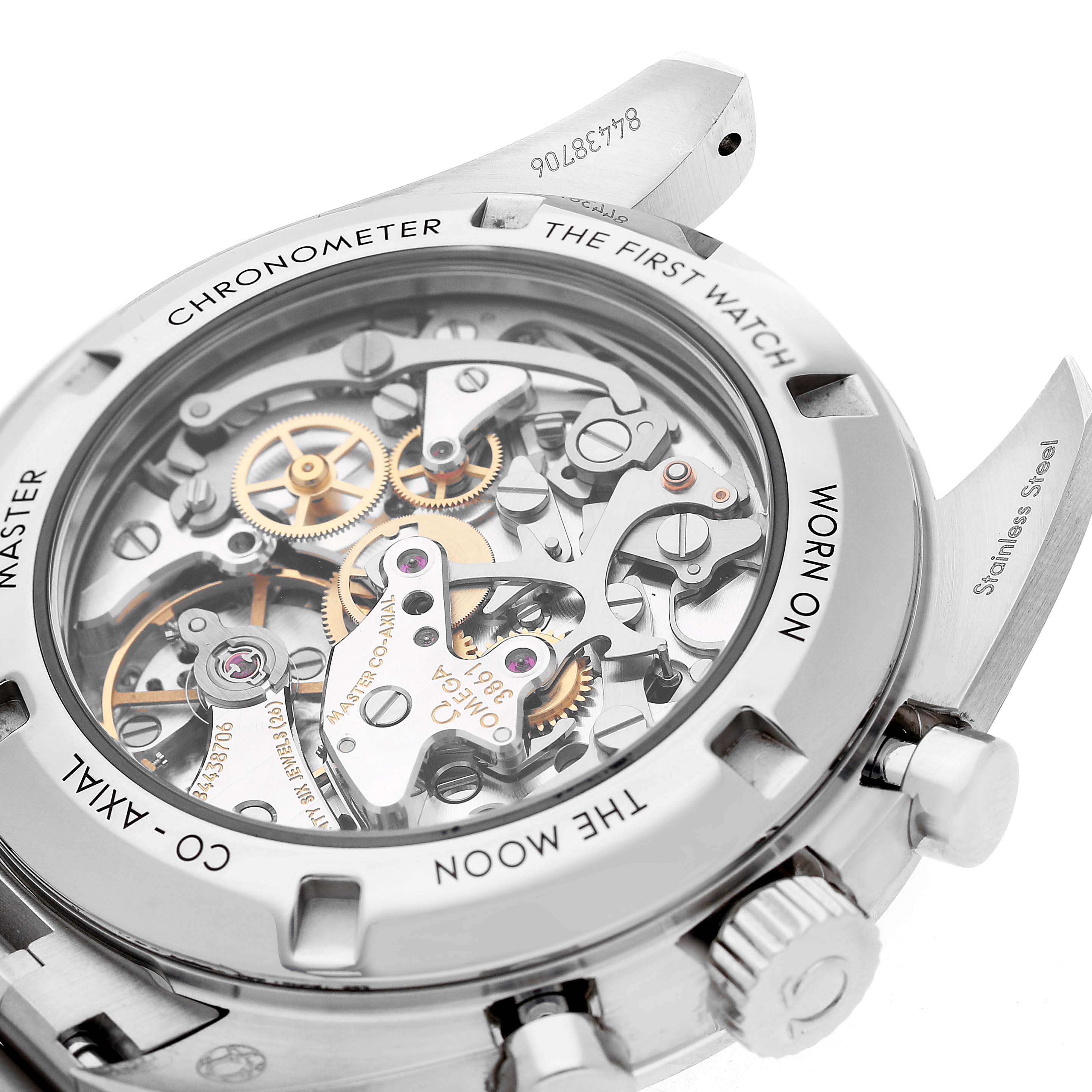 The image shows the back view of an Omega Speedmaster 310.30.42.50.01.002 Men's Stainless Steel Black Dial, highlighting its intricate mechanical movement.