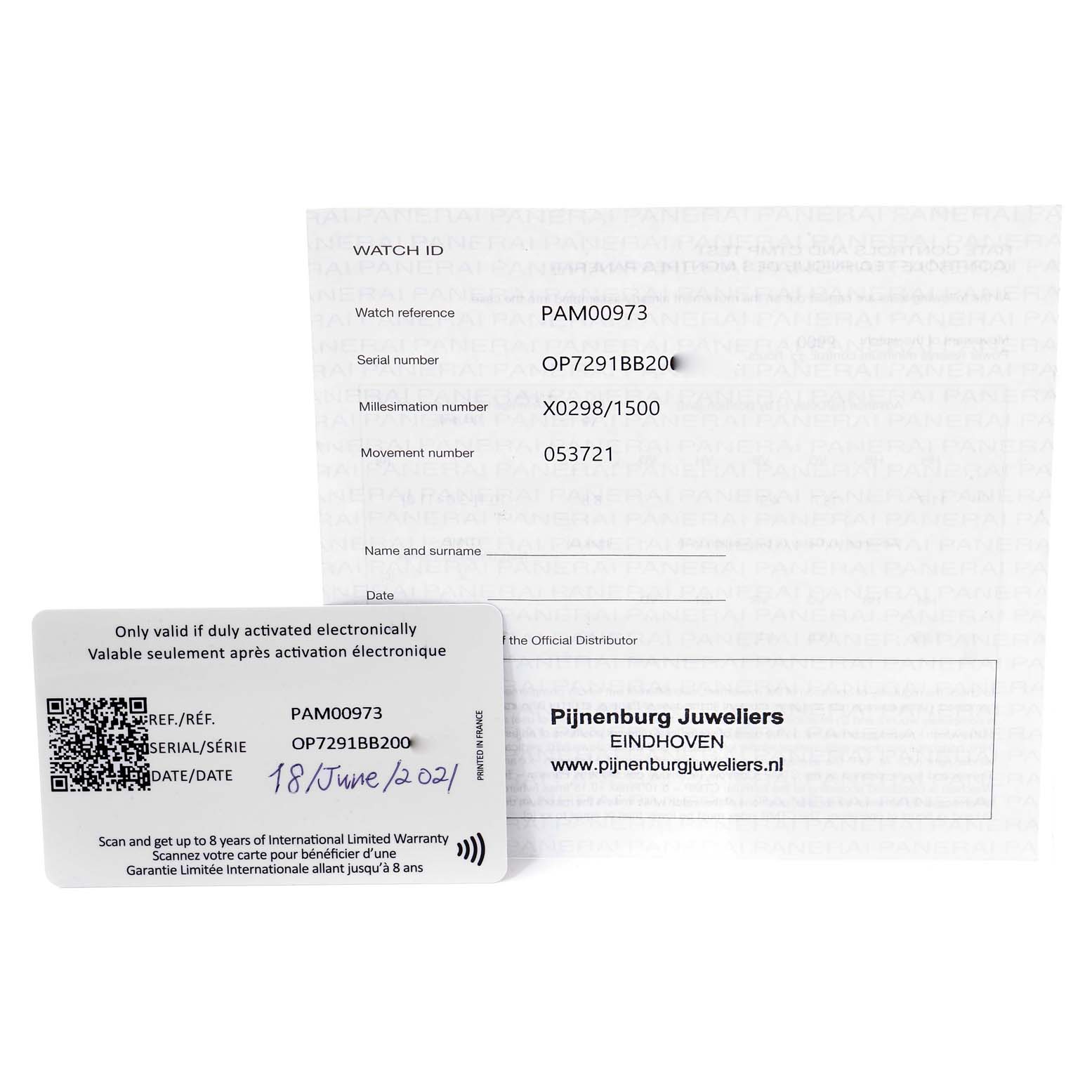 The image shows warranty and identification cards for the Panerai Submersible PAM00973 Men's Stainless Steel Black Dial PAM00973 Men's Stainless Steel Black Dial model, including the watch reference and serial numbers.